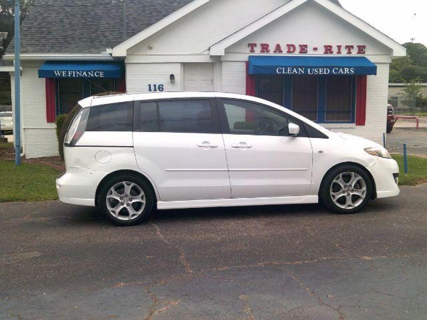 2009 Crystal White Pearl Mazda MAZDA5 Sport (JM1CR293590) with an 2.3L L4 DOHC 16V engine, located at 116 N. Frazier Street, Conroe, TX, 77301, (936) 647-0690, 30.308662, -95.460480 - Photo#0