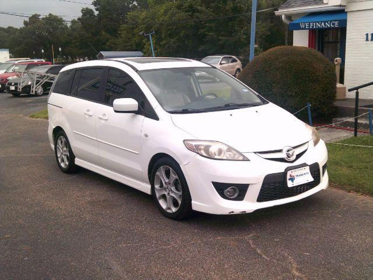 2009 Crystal White Pearl Mazda MAZDA5 Sport (JM1CR293590) with an 2.3L L4 DOHC 16V engine, located at 116 N. Frazier Street, Conroe, TX, 77301, (936) 647-0690, 30.308662, -95.460480 - Photo#1