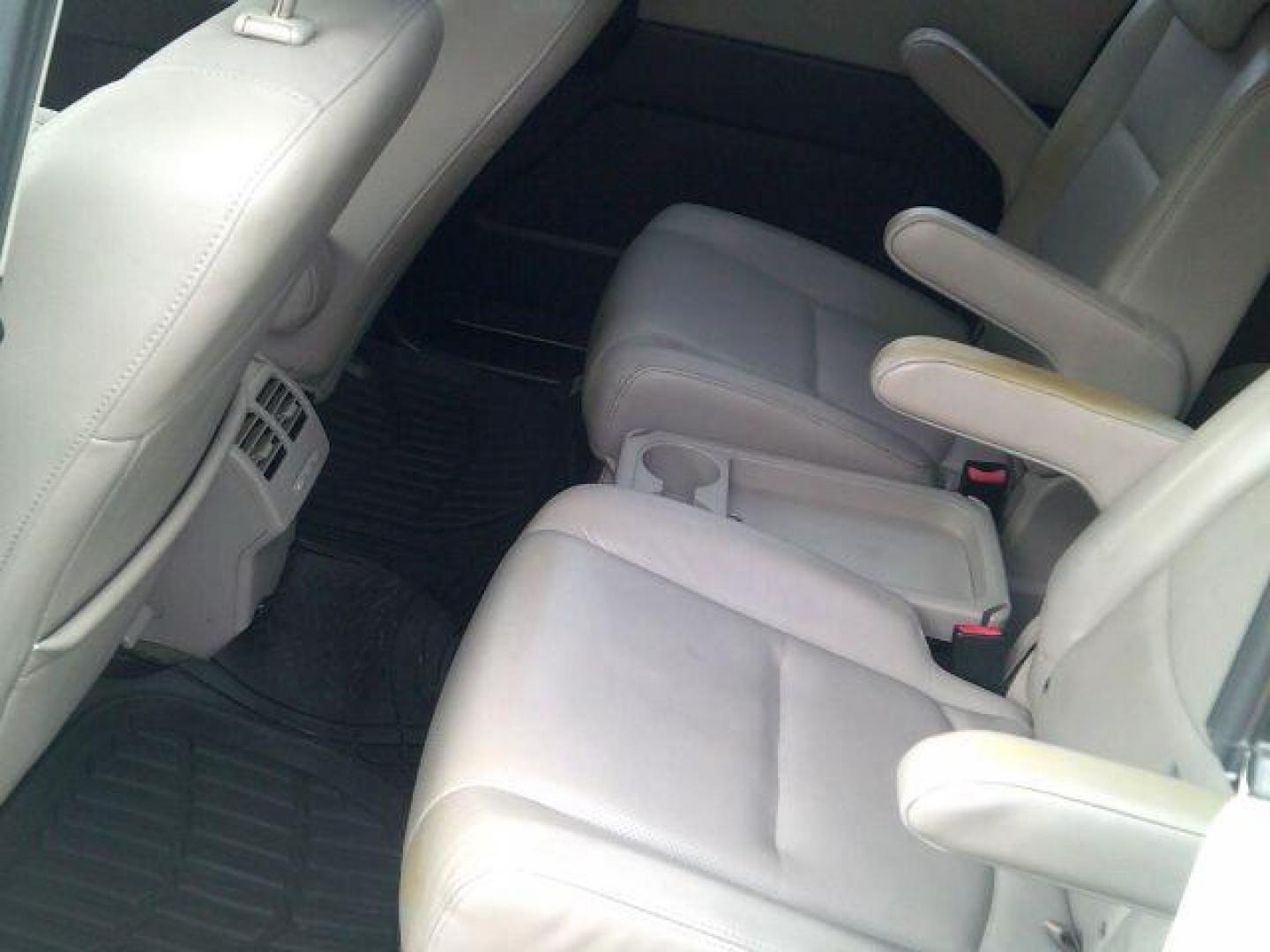 2009 Crystal White Pearl Mazda MAZDA5 Sport (JM1CR293590) with an 2.3L L4 DOHC 16V engine, located at 116 N. Frazier Street, Conroe, TX, 77301, (936) 647-0690, 30.308662, -95.460480 - Photo#5