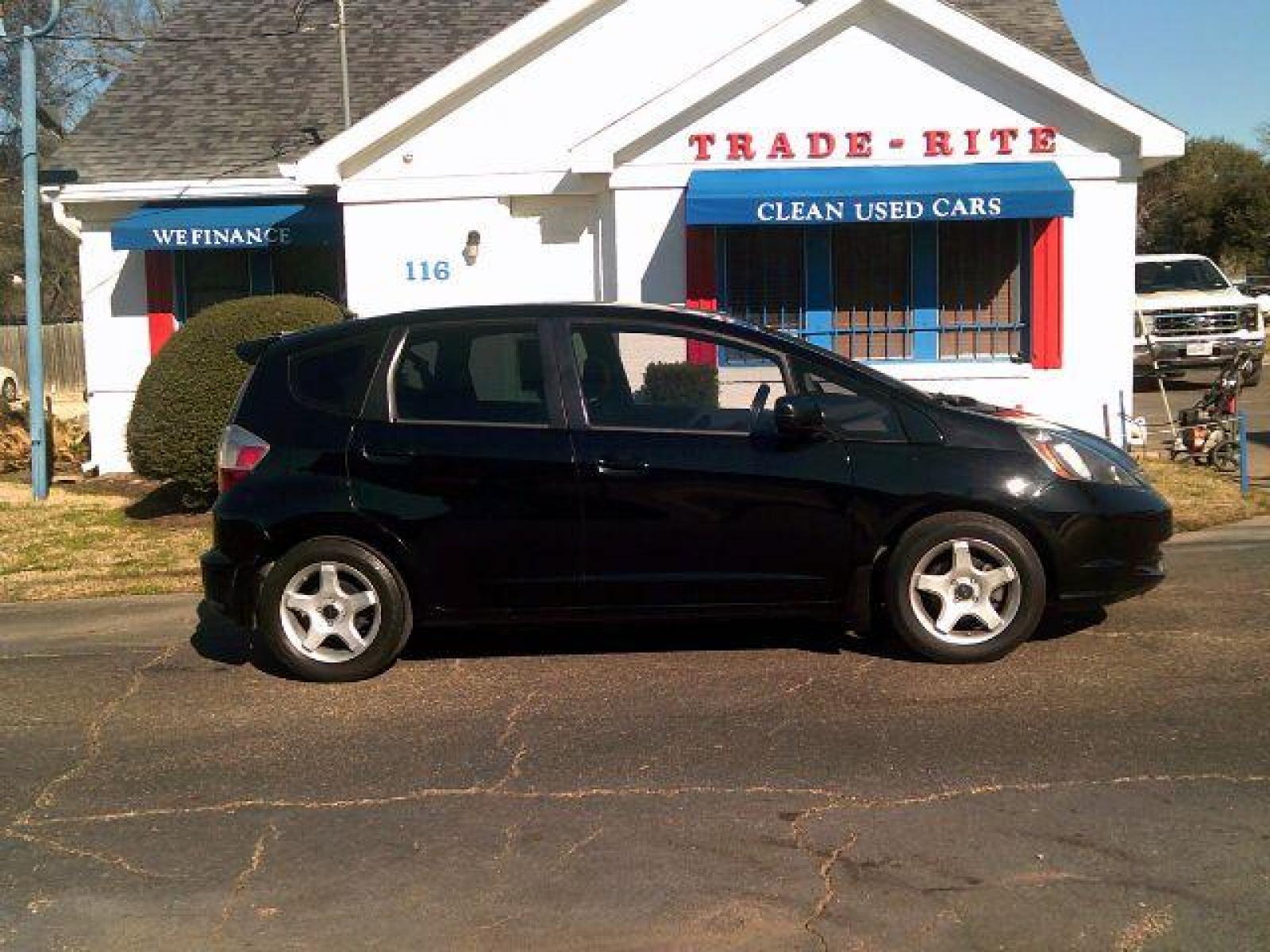 2009 Crystal Black Pearl Honda Fit 5-Speed MT (JHMGE87219S) with an 1.5L L4 SOHC 16V engine, 5-Speed Manual transmission, located at 116 N. Frazier Street, Conroe, TX, 77301, (936) 647-0690, 30.308662, -95.460480 - Photo #0