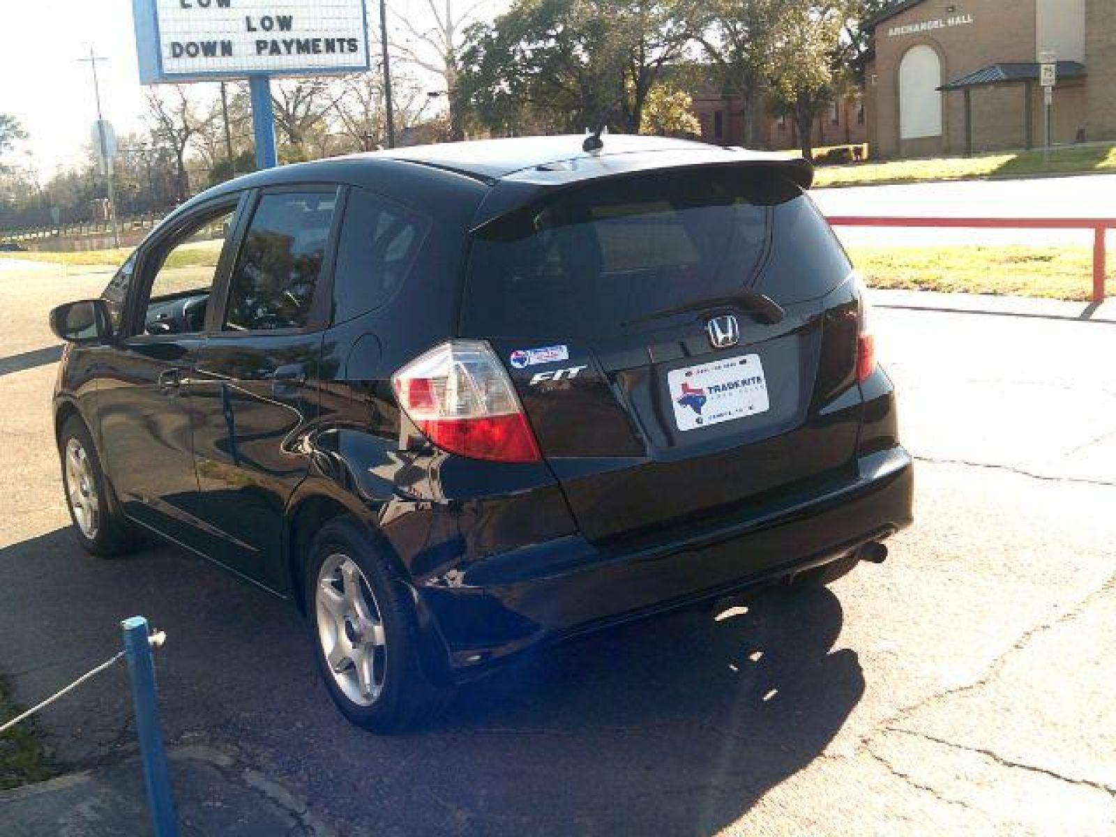 2009 Crystal Black Pearl Honda Fit 5-Speed MT (JHMGE87219S) with an 1.5L L4 SOHC 16V engine, 5-Speed Manual transmission, located at 116 N. Frazier Street, Conroe, TX, 77301, (936) 647-0690, 30.308662, -95.460480 - Photo #4