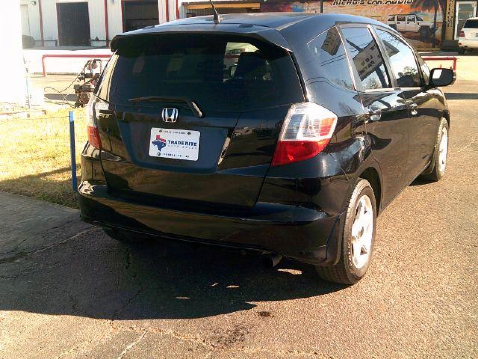 2009 Crystal Black Pearl Honda Fit 5-Speed MT (JHMGE87219S) with an 1.5L L4 SOHC 16V engine, 5-Speed Manual transmission, located at 116 N. Frazier Street, Conroe, TX, 77301, (936) 647-0690, 30.308662, -95.460480 - Photo #5