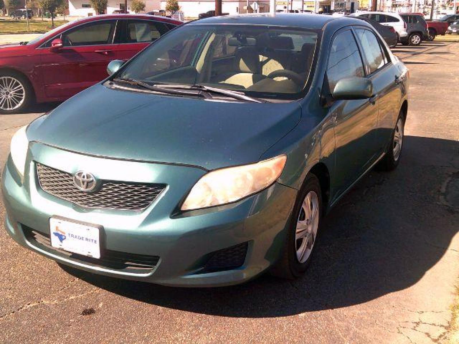 2009 Capri Sea Metallic /Ash Cloth Interior Toyota Corolla LE 4-Speed AT (JTDBL40E999) with an 1.8L L4 DOHC 16V engine, 4-Speed Automatic transmission, located at 116 N. Frazier Street, Conroe, TX, 77301, (936) 647-0690, 30.308662, -95.460480 - Photo #2