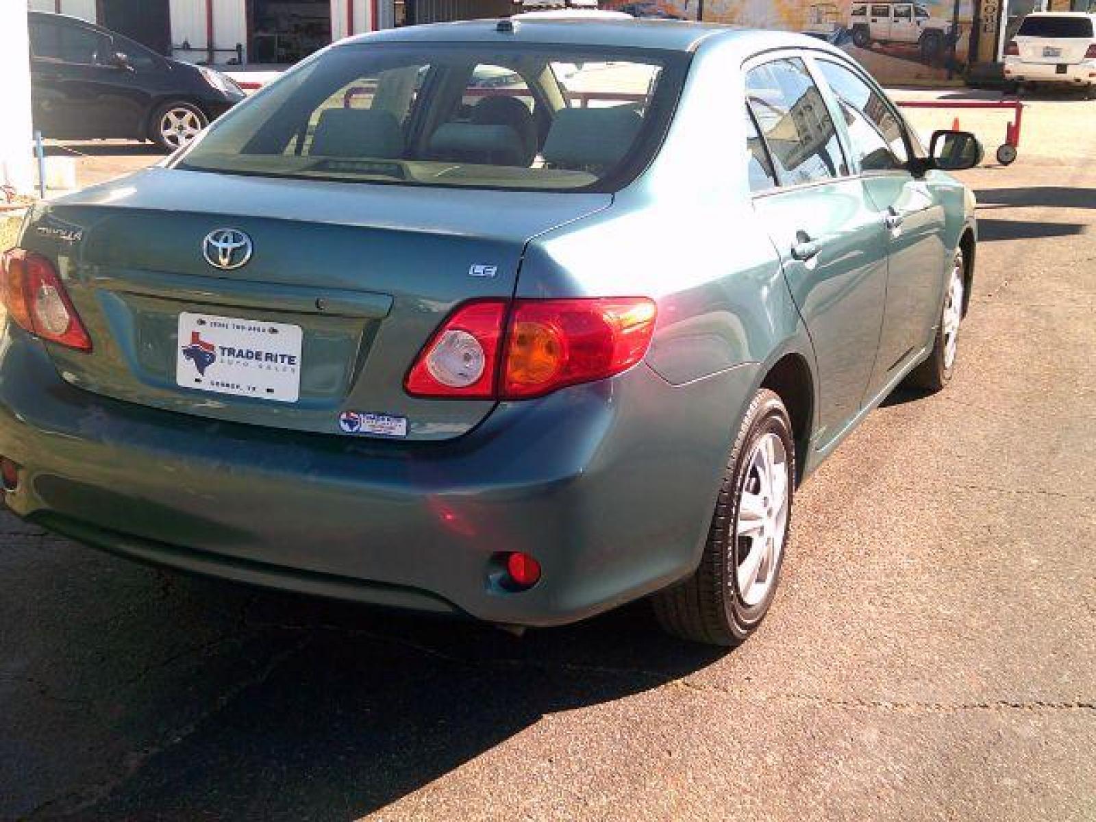 2009 Capri Sea Metallic /Ash Cloth Interior Toyota Corolla LE 4-Speed AT (JTDBL40E999) with an 1.8L L4 DOHC 16V engine, 4-Speed Automatic transmission, located at 116 N. Frazier Street, Conroe, TX, 77301, (936) 647-0690, 30.308662, -95.460480 - Photo #5