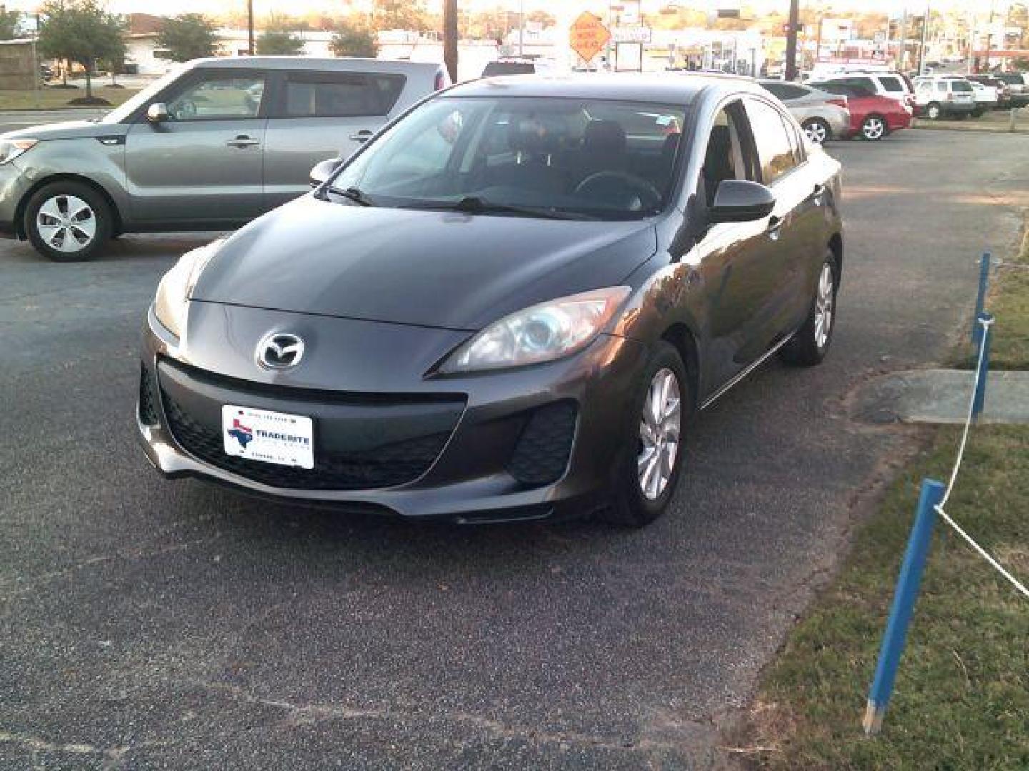 2013 Dolphin Gray Mica /Black Mazda MAZDA3 i Touring AT 4-Door (JM1BL1V7XD1) with an 2.0L L4 DOHC 16V engine, 5-Speed Automatic transmission, located at 116 N. Frazier Street, Conroe, TX, 77301, (936) 647-0690, 30.308662, -95.460480 - Photo#2