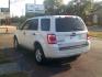 2009 White Suede /Charcoal Black Cloth Ford Escape XLT FWD V6 (1FMCU03G79K) with an 3.0L V6 DOHC 24V engine, 4-Speed Automatic transmission, located at 116 N. Frazier Street, Conroe, TX, 77301, (936) 647-0690, 30.308662, -95.460480 - Photo#4
