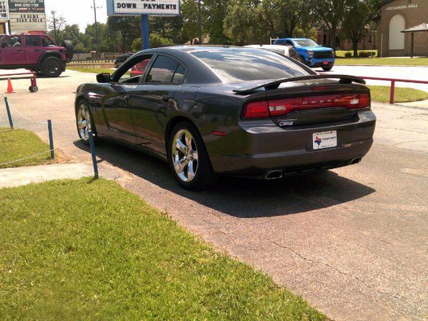 2013 Granite Crystal Meta /Black Cloth Interior Dodge Charger SE (2C3CDXBG9DH) with an 3.6L V6 DOHC 24V engine, 5-Speed Automatic transmission, located at 116 N. Frazier Street, Conroe, TX, 77301, (936) 647-0690, 30.308662, -95.460480 - Photo#4