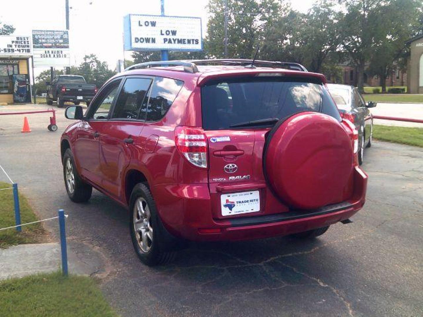 2010 Barcelona Red Metall /Ash Cloth Interior Toyota RAV4 Base I4 2WD (JTMZF4DV8AD) with an 2.4L L4 DOHC 16V engine, 4-Speed Automatic transmission, located at 116 N. Frazier Street, Conroe, TX, 77301, (936) 647-0690, 30.308662, -95.460480 - Photo#4