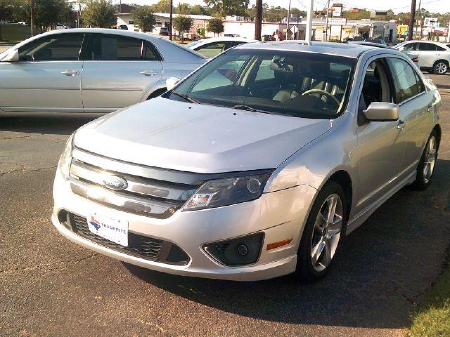 2012 Ingot Silver Metallic /Charcoal Black Leather Interior Ford Fusion SPORT (3FAHP0KC6CR) with an 3.5L V6 DOHC 24V engine, located at 116 N. Frazier Street, Conroe, TX, 77301, (936) 647-0690, 30.308662, -95.460480 - Photo#2