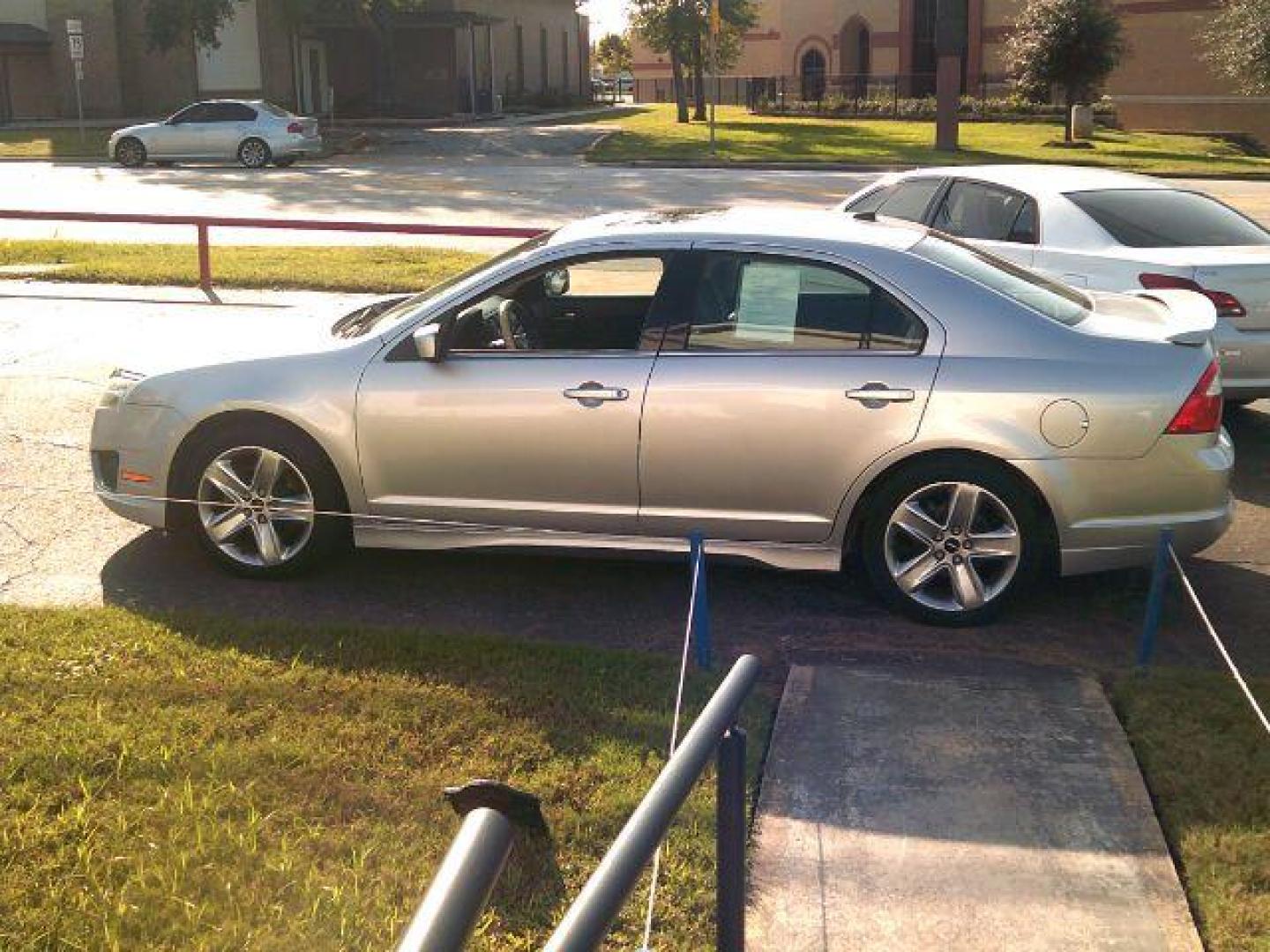 2012 Ingot Silver Metallic /Charcoal Black Leather Interior Ford Fusion SPORT (3FAHP0KC6CR) with an 3.5L V6 DOHC 24V engine, located at 116 N. Frazier Street, Conroe, TX, 77301, (936) 647-0690, 30.308662, -95.460480 - Photo#3