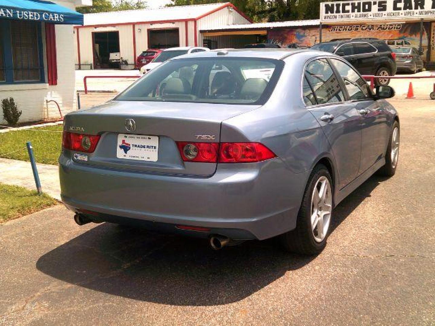 2007 Arctic Blue Pearl /Parchment Leather In Acura TSX 5-Speed AT (JH4CL96837C) with an 2.4L L4 DOHC 16V engine, 5-Speed Automatic transmission, located at 116 N. Frazier Street, Conroe, TX, 77301, (936) 647-0690, 30.308662, -95.460480 - Photo#5