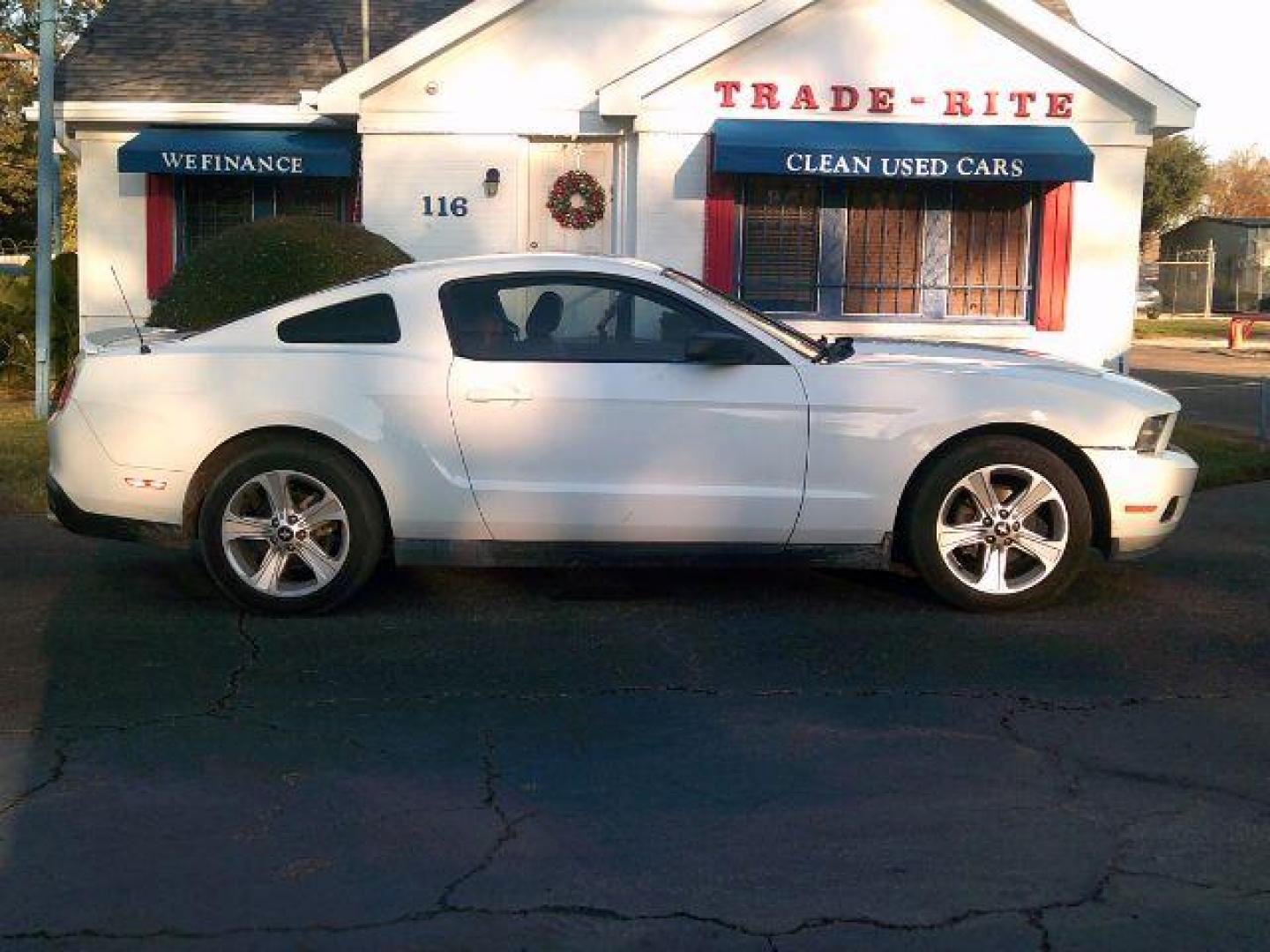 2010 Performance White /Tan Leather Ford Mustang V6 Coupe (1ZVBP8AN2A5) with an 4.0L V6 OHC 12V engine, located at 116 N. Frazier Street, Conroe, TX, 77301, (936) 647-0690, 30.308662, -95.460480 - Photo#0