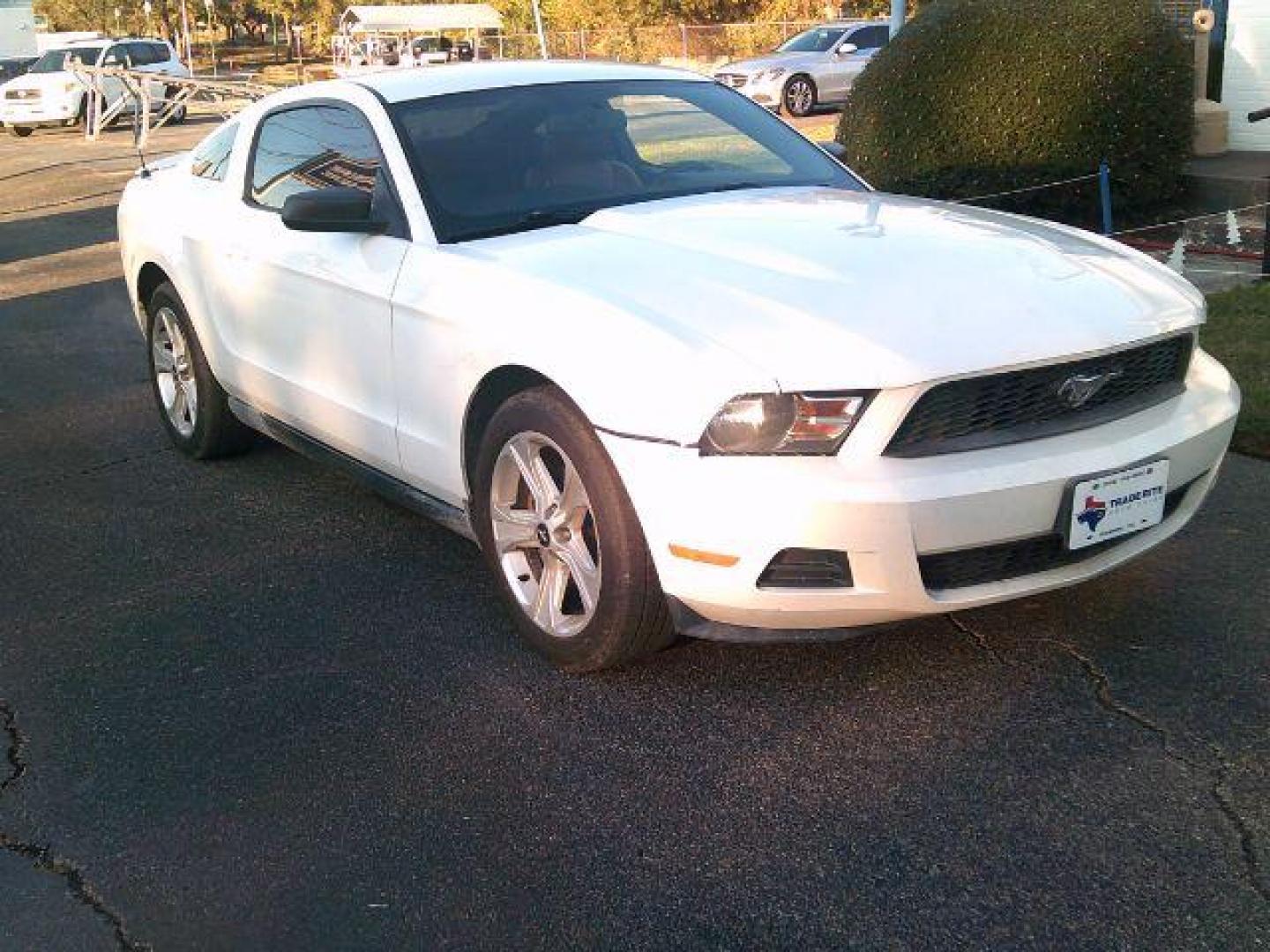 2010 Performance White /Tan Leather Ford Mustang V6 Coupe (1ZVBP8AN2A5) with an 4.0L V6 OHC 12V engine, located at 116 N. Frazier Street, Conroe, TX, 77301, (936) 647-0690, 30.308662, -95.460480 - Photo#1