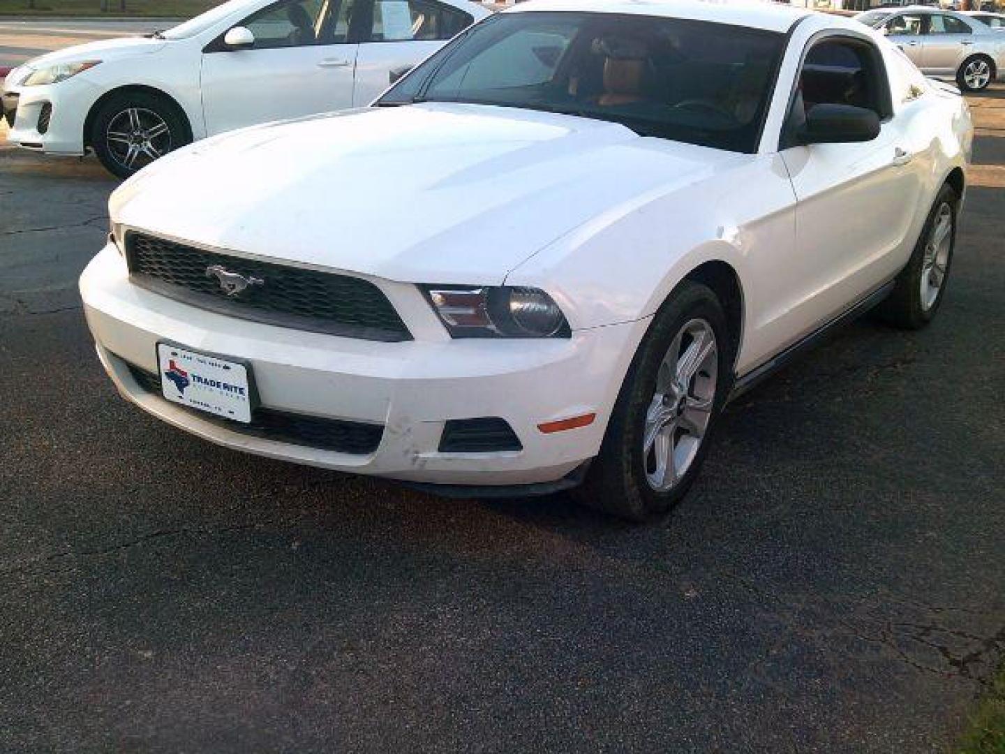2010 Performance White /Tan Leather Ford Mustang V6 Coupe (1ZVBP8AN2A5) with an 4.0L V6 OHC 12V engine, located at 116 N. Frazier Street, Conroe, TX, 77301, (936) 647-0690, 30.308662, -95.460480 - Photo#2