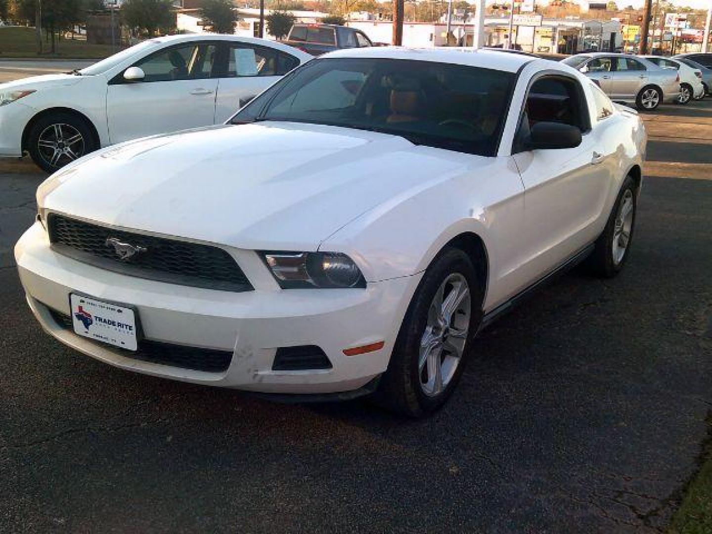 2010 Performance White /Tan Leather Ford Mustang V6 Coupe (1ZVBP8AN2A5) with an 4.0L V6 OHC 12V engine, located at 116 N. Frazier Street, Conroe, TX, 77301, (936) 647-0690, 30.308662, -95.460480 - Photo#3