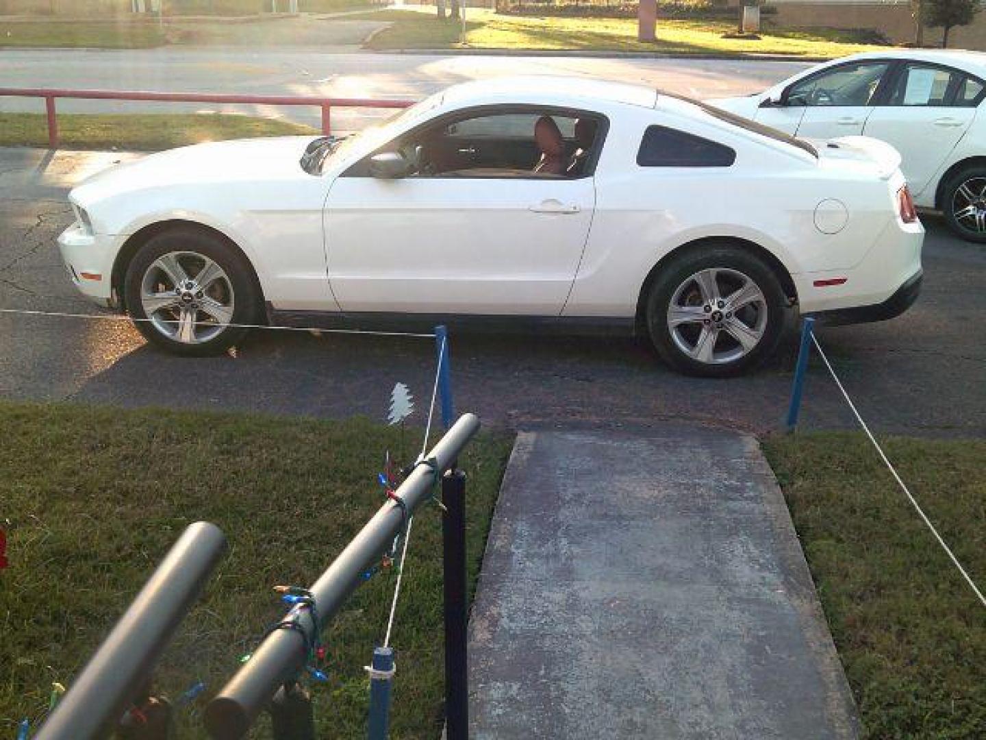 2010 Performance White /Tan Leather Ford Mustang V6 Coupe (1ZVBP8AN2A5) with an 4.0L V6 OHC 12V engine, located at 116 N. Frazier Street, Conroe, TX, 77301, (936) 647-0690, 30.308662, -95.460480 - Photo#4