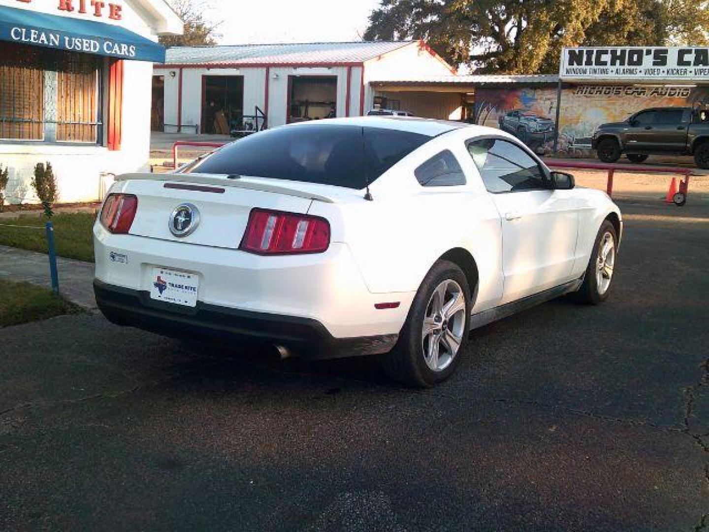 2010 Performance White /Tan Leather Ford Mustang V6 Coupe (1ZVBP8AN2A5) with an 4.0L V6 OHC 12V engine, located at 116 N. Frazier Street, Conroe, TX, 77301, (936) 647-0690, 30.308662, -95.460480 - Photo#6