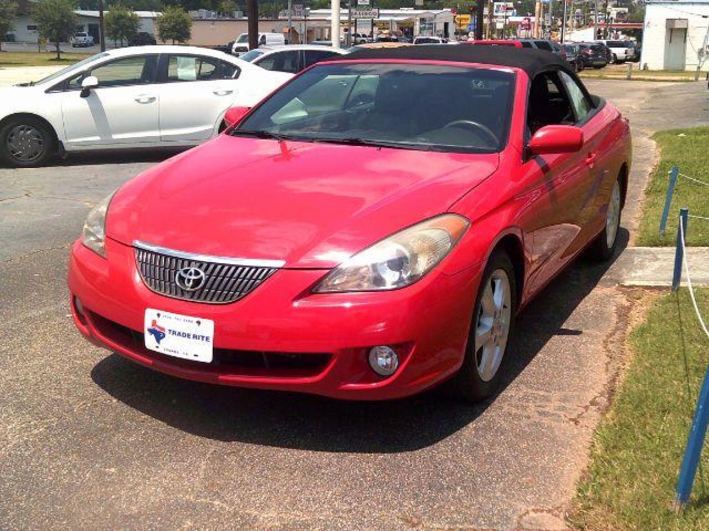 2006 Absolutely Red /Ivory Toyota Camry Solara SE | SLE (4T1FA38PX6U) with an 3.3L V-6 DOHC engine, 5-Speed Automatic transmission, located at 116 N. Frazier Street, Conroe, TX, 77301, (936) 647-0690, 30.308662, -95.460480 - Photo#2