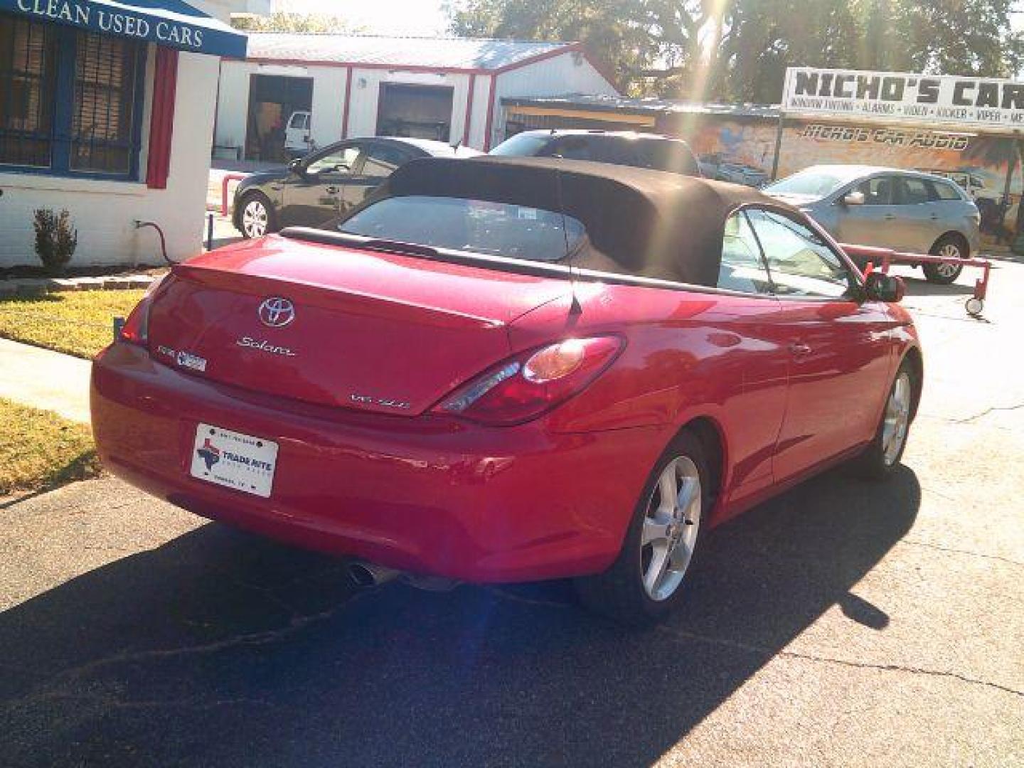 2006 Absolutely Red /Ivory Toyota Camry Solara SE | SLE (4T1FA38PX6U) with an 3.3L V-6 DOHC engine, 5-Speed Automatic transmission, located at 116 N. Frazier Street, Conroe, TX, 77301, (936) 647-0690, 30.308662, -95.460480 - Photo#5