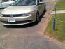 2014 gold /Gray Leather Volkswagen Jetta SE (3VWD17AJ4EM) with an 1.8L engine, AUTOMATIC transmission, located at 116 N. Frazier Street, Conroe, TX, 77301, (936) 647-0690, 30.308662, -95.460480 - Photo#2