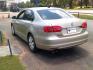2014 gold /Gray Leather Volkswagen Jetta SE (3VWD17AJ4EM) with an 1.8L engine, AUTOMATIC transmission, located at 116 N. Frazier Street, Conroe, TX, 77301, (936) 647-0690, 30.308662, -95.460480 - Photo#4