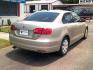 2014 gold /Gray Leather Volkswagen Jetta SE (3VWD17AJ4EM) with an 1.8L engine, AUTOMATIC transmission, located at 116 N. Frazier Street, Conroe, TX, 77301, (936) 647-0690, 30.308662, -95.460480 - Photo#5