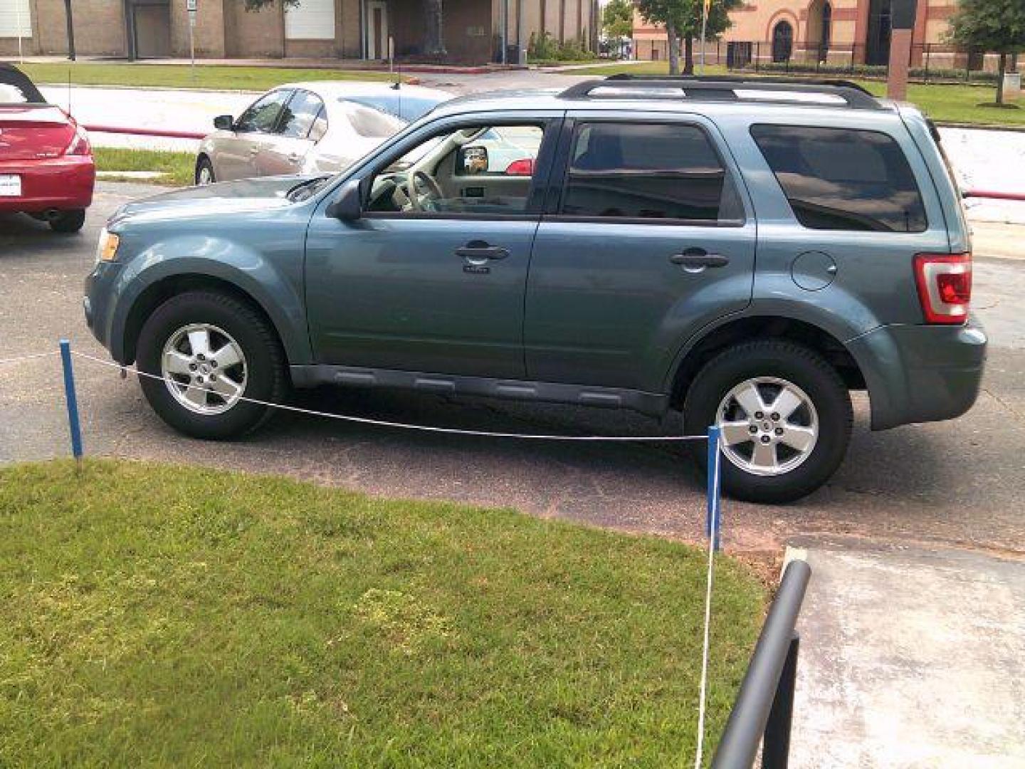 2012 Steel Blue Metallic /Stone Ford Escape XLT (1FMCU0DG6CK) , located at 116 N. Frazier Street, Conroe, TX, 77301, (936) 647-0690, 30.308662, -95.460480 - Photo#4