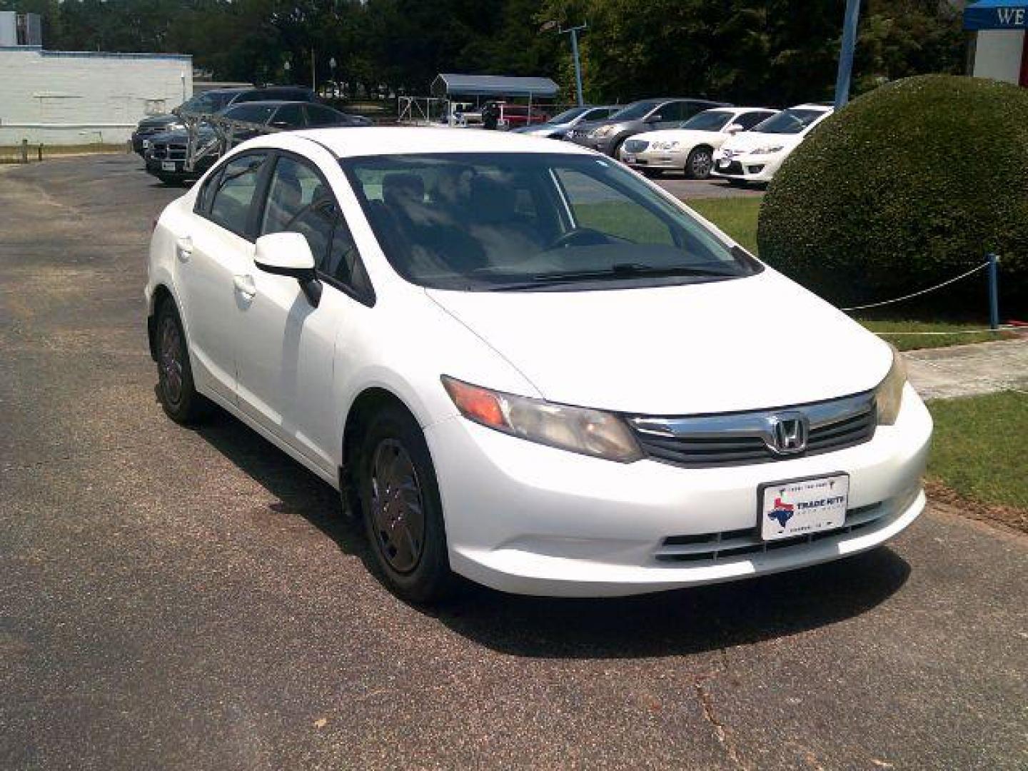 2012 Taffeta White /Stone Honda Civic LX (2HGFB2F5XCH) with an 1.8L I-4 i-VTEC variable valve control engine, 5-Speed Automatic transmission, located at 116 N. Frazier Street, Conroe, TX, 77301, (936) 647-0690, 30.308662, -95.460480 - Photo#1