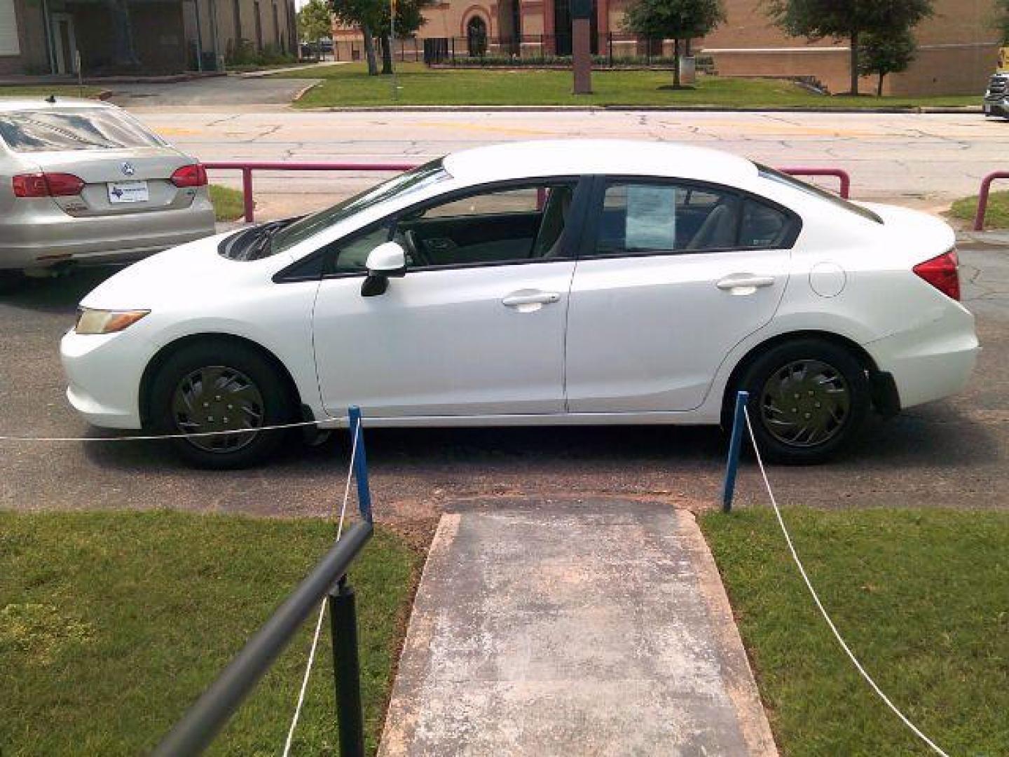 2012 Taffeta White /Stone Honda Civic LX (2HGFB2F5XCH) with an 1.8L I-4 i-VTEC variable valve control engine, 5-Speed Automatic transmission, located at 116 N. Frazier Street, Conroe, TX, 77301, (936) 647-0690, 30.308662, -95.460480 - Photo#3
