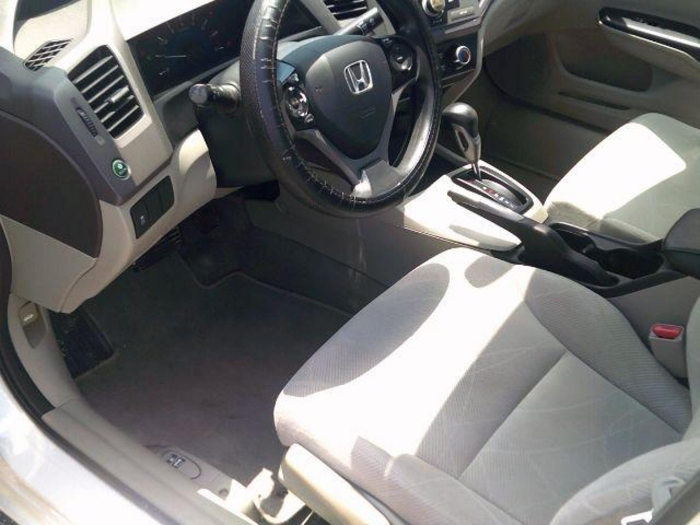 2012 Taffeta White /Stone Honda Civic LX (2HGFB2F5XCH) with an 1.8L I-4 i-VTEC variable valve control engine, 5-Speed Automatic transmission, located at 116 N. Frazier Street, Conroe, TX, 77301, (936) 647-0690, 30.308662, -95.460480 - Photo#7