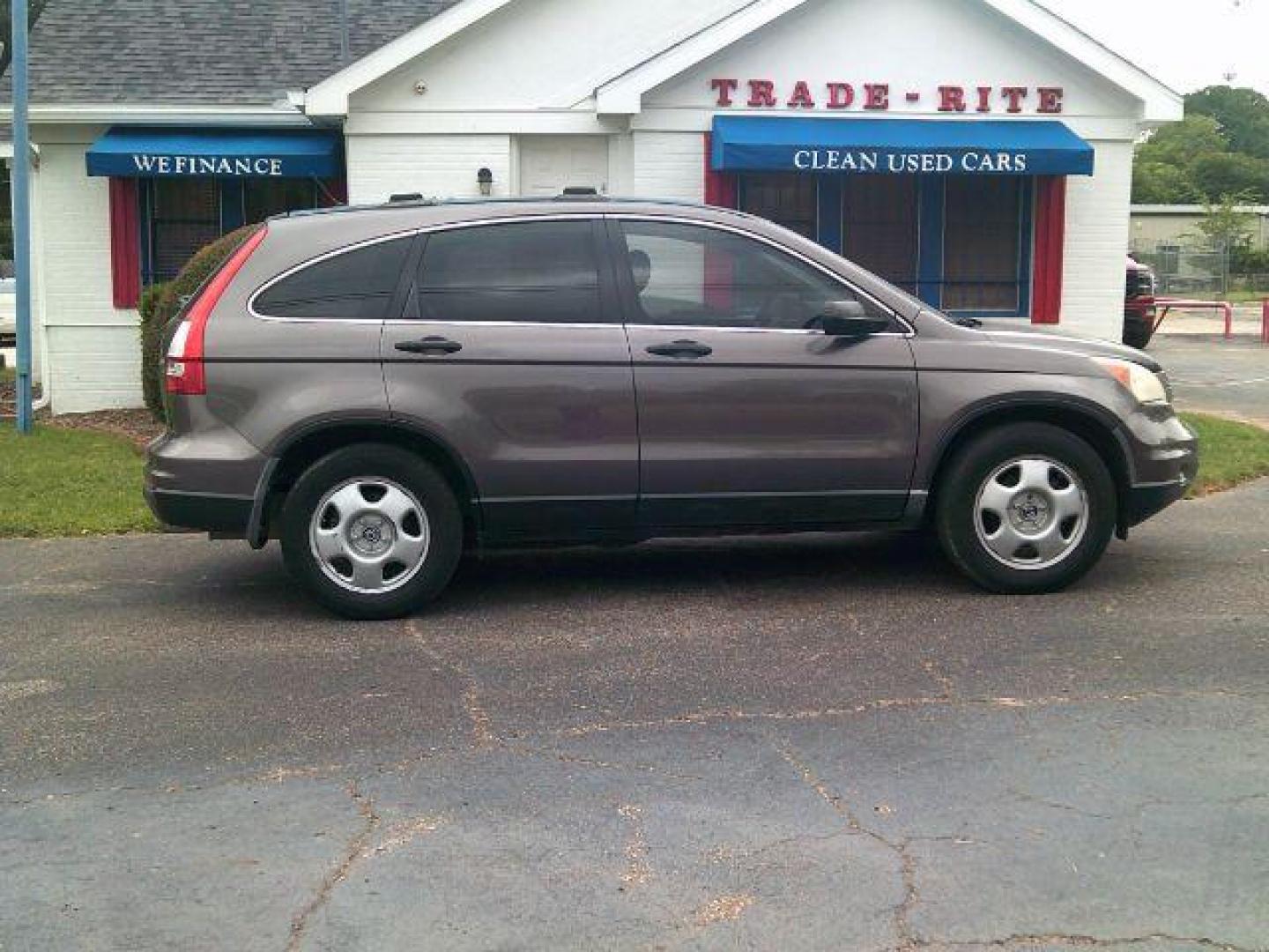 2010 Urban Titanium Metallic /Black Honda CR-V LX (3CZRE3H39AG) with an 2.4L I-4 DOHC engine, located at 116 N. Frazier Street, Conroe, TX, 77301, (936) 647-0690, 30.308662, -95.460480 - Photo#0