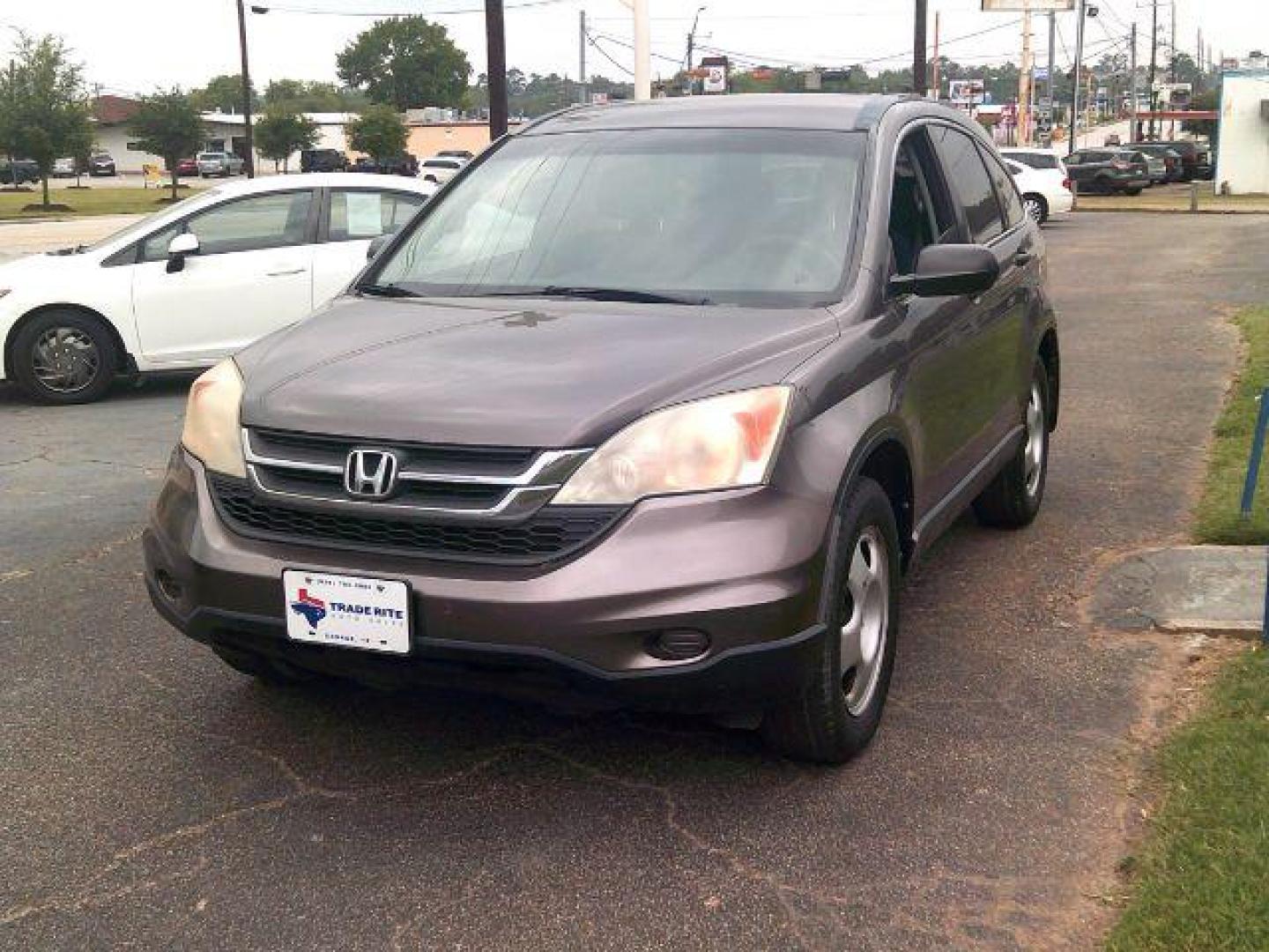 2010 Urban Titanium Metallic /Black Honda CR-V LX (3CZRE3H39AG) with an 2.4L I-4 DOHC engine, located at 116 N. Frazier Street, Conroe, TX, 77301, (936) 647-0690, 30.308662, -95.460480 - Photo#2