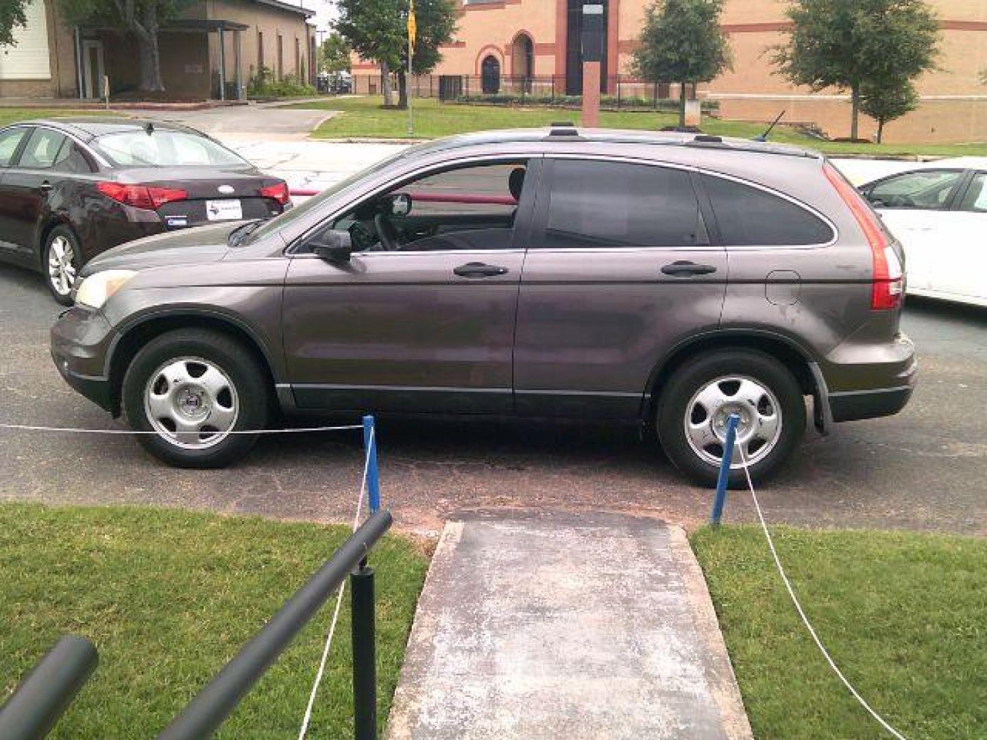2010 Urban Titanium Metallic /Black Honda CR-V LX (3CZRE3H39AG) with an 2.4L I-4 DOHC engine, located at 116 N. Frazier Street, Conroe, TX, 77301, (936) 647-0690, 30.308662, -95.460480 - Photo#3