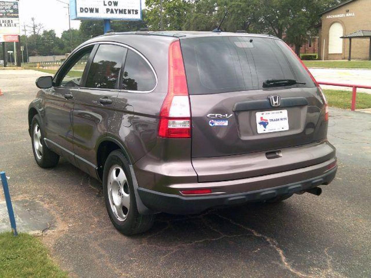 2010 Urban Titanium Metallic /Black Honda CR-V LX (3CZRE3H39AG) with an 2.4L I-4 DOHC engine, located at 116 N. Frazier Street, Conroe, TX, 77301, (936) 647-0690, 30.308662, -95.460480 - Photo#4