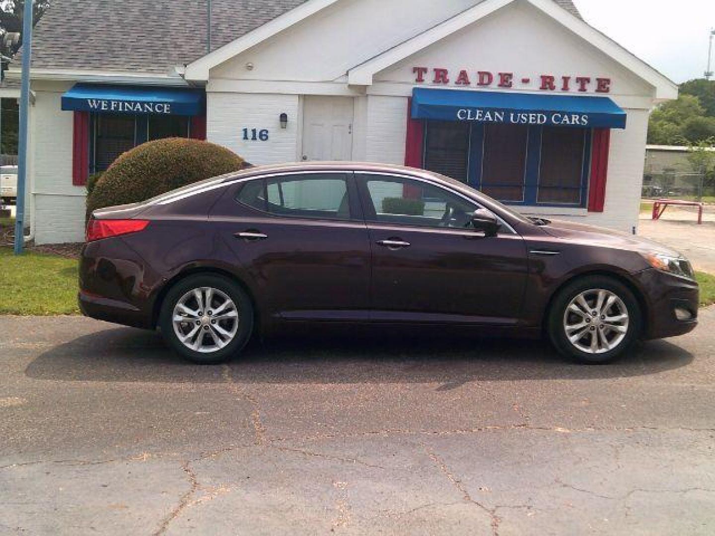 2013 Dark Cherry Pearl Metallic /Beige Kia Optima LX (5XXGM4A7XDG) with an 2.4L I-4 gasoline direct injection engine, 5-Speed Automatic transmission, located at 116 N. Frazier Street, Conroe, TX, 77301, (936) 647-0690, 30.308662, -95.460480 - Photo#0