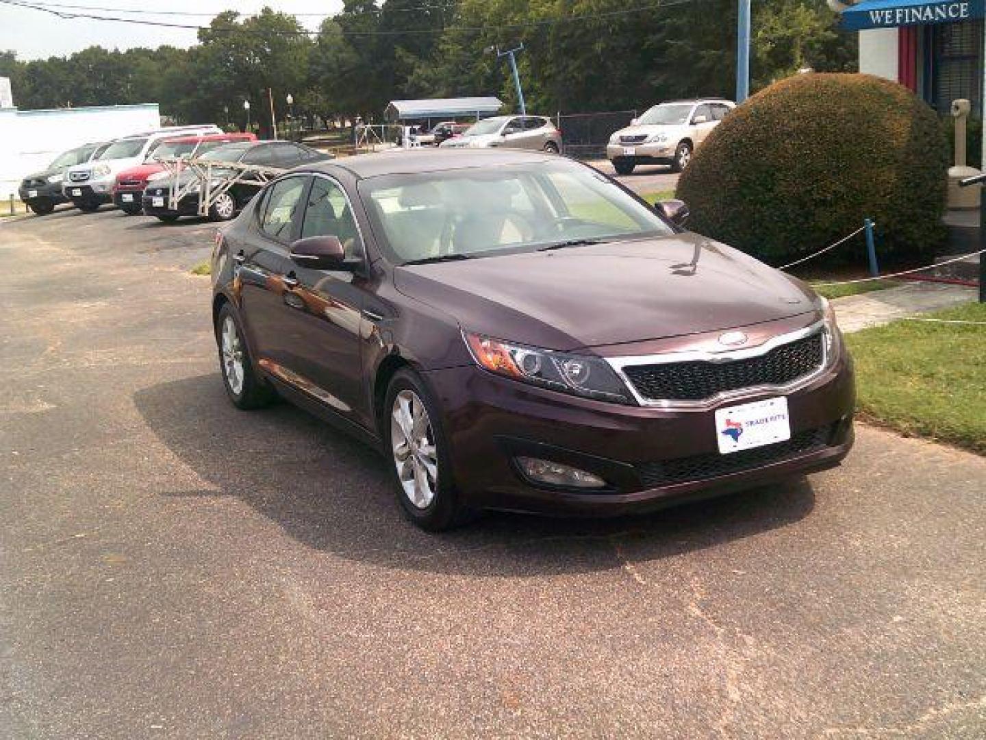 2013 Dark Cherry Pearl Metallic /Beige Kia Optima LX (5XXGM4A7XDG) with an 2.4L I-4 gasoline direct injection engine, 5-Speed Automatic transmission, located at 116 N. Frazier Street, Conroe, TX, 77301, (936) 647-0690, 30.308662, -95.460480 - Photo#1