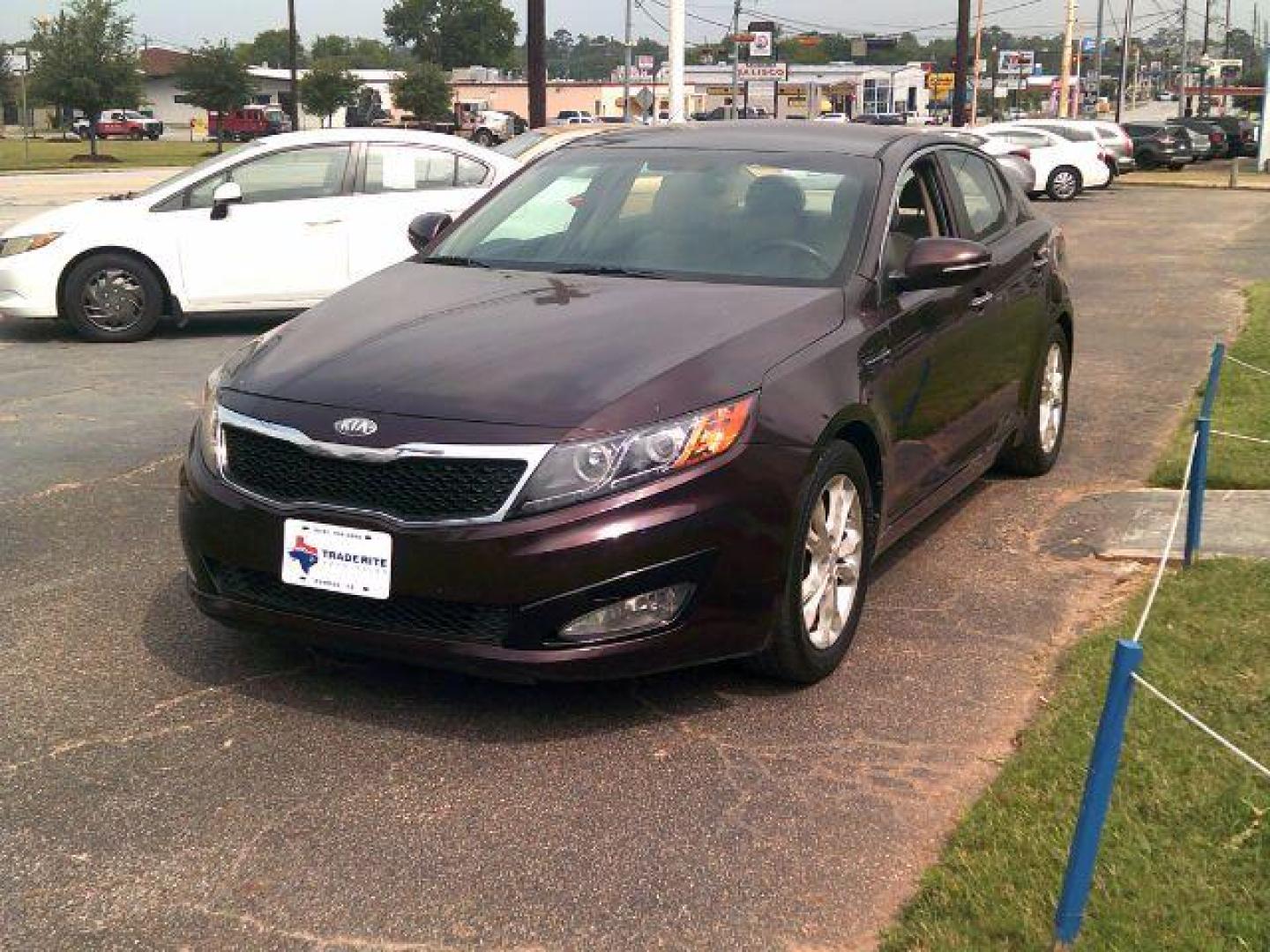 2013 Dark Cherry Pearl Metallic /Beige Kia Optima LX (5XXGM4A7XDG) with an 2.4L I-4 gasoline direct injection engine, 5-Speed Automatic transmission, located at 116 N. Frazier Street, Conroe, TX, 77301, (936) 647-0690, 30.308662, -95.460480 - Photo#2