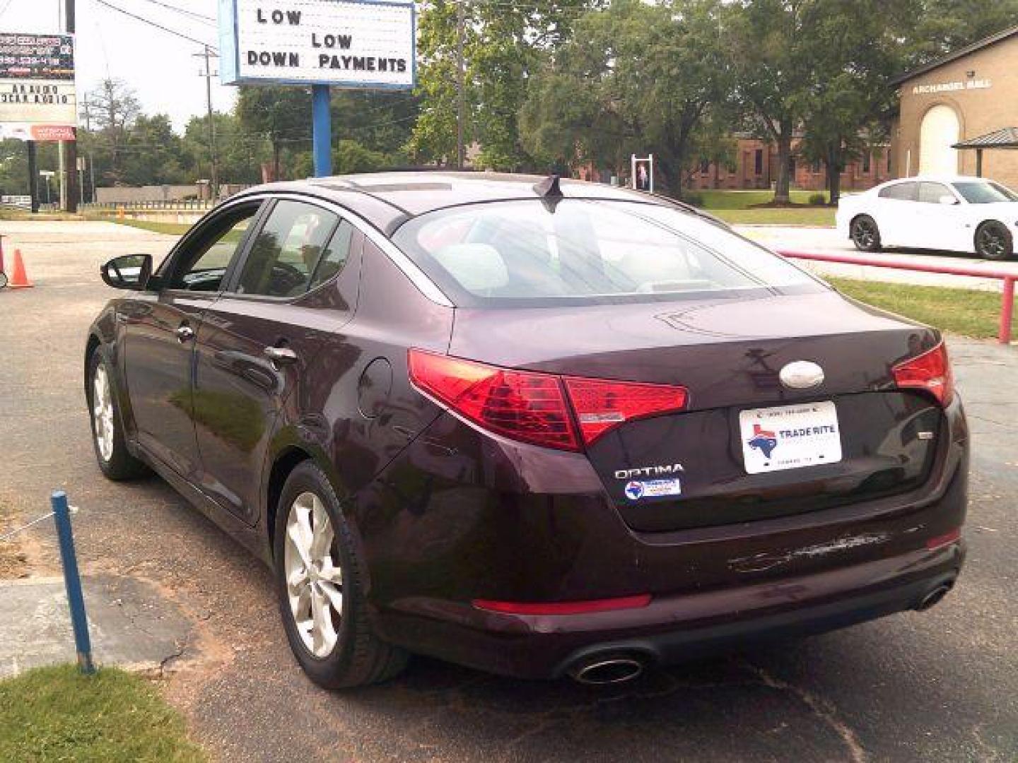 2013 Dark Cherry Pearl Metallic /Beige Kia Optima LX (5XXGM4A7XDG) with an 2.4L I-4 gasoline direct injection engine, 5-Speed Automatic transmission, located at 116 N. Frazier Street, Conroe, TX, 77301, (936) 647-0690, 30.308662, -95.460480 - Photo#3