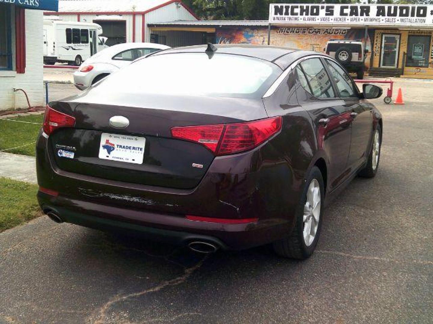 2013 Dark Cherry Pearl Metallic /Beige Kia Optima LX (5XXGM4A7XDG) with an 2.4L I-4 gasoline direct injection engine, 5-Speed Automatic transmission, located at 116 N. Frazier Street, Conroe, TX, 77301, (936) 647-0690, 30.308662, -95.460480 - Photo#4
