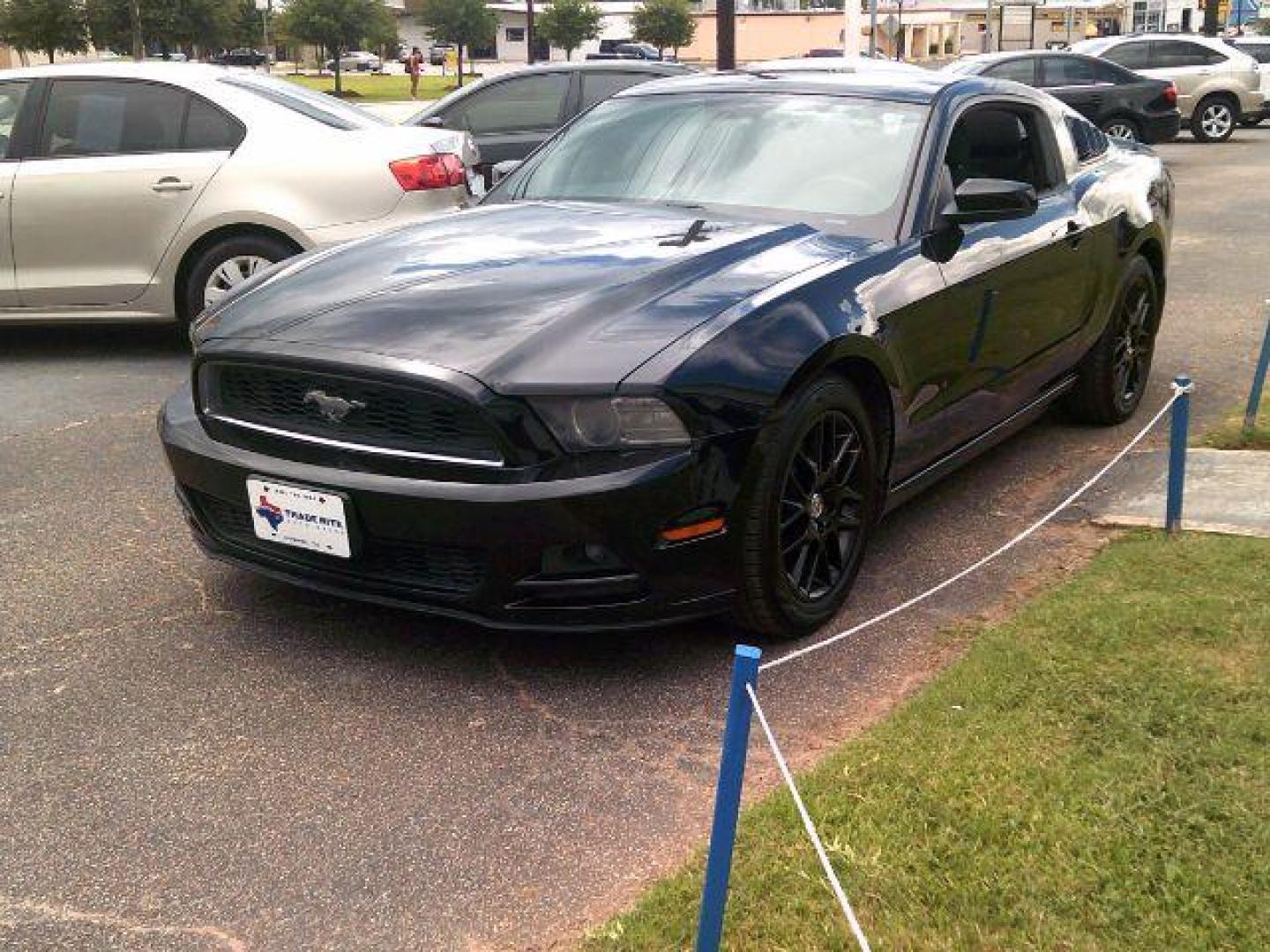 2014 Black /Medium Stone Ford Mustang V6 (1ZVBP8AM0E5) with an 3.7L V-6 DOHC engine, 5-Speed Automatic transmission, located at 116 N. Frazier Street, Conroe, TX, 77301, (936) 647-0690, 30.308662, -95.460480 - Photo#2