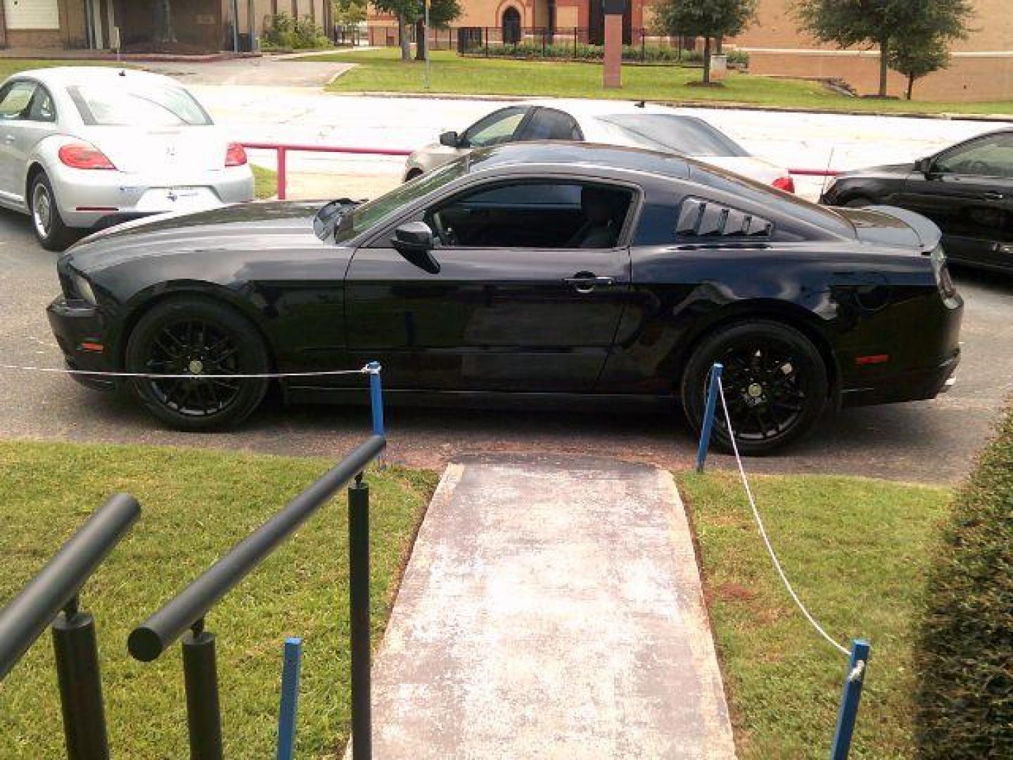 2014 Black /Medium Stone Ford Mustang V6 (1ZVBP8AM0E5) with an 3.7L V-6 DOHC engine, 5-Speed Automatic transmission, located at 116 N. Frazier Street, Conroe, TX, 77301, (936) 647-0690, 30.308662, -95.460480 - Photo#3