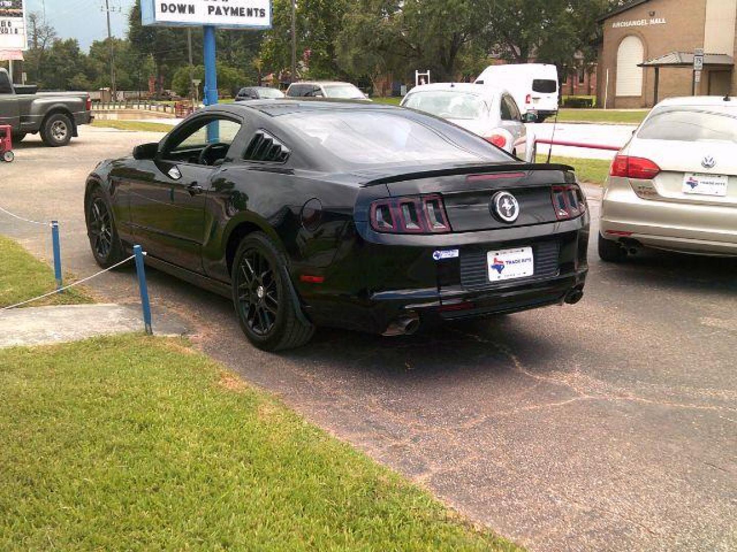 2014 Black /Medium Stone Ford Mustang V6 (1ZVBP8AM0E5) with an 3.7L V-6 DOHC engine, 5-Speed Automatic transmission, located at 116 N. Frazier Street, Conroe, TX, 77301, (936) 647-0690, 30.308662, -95.460480 - Photo#4