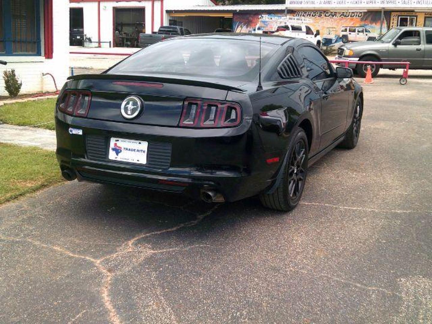 2014 Black /Medium Stone Ford Mustang V6 (1ZVBP8AM0E5) with an 3.7L V-6 DOHC engine, 5-Speed Automatic transmission, located at 116 N. Frazier Street, Conroe, TX, 77301, (936) 647-0690, 30.308662, -95.460480 - Photo#5
