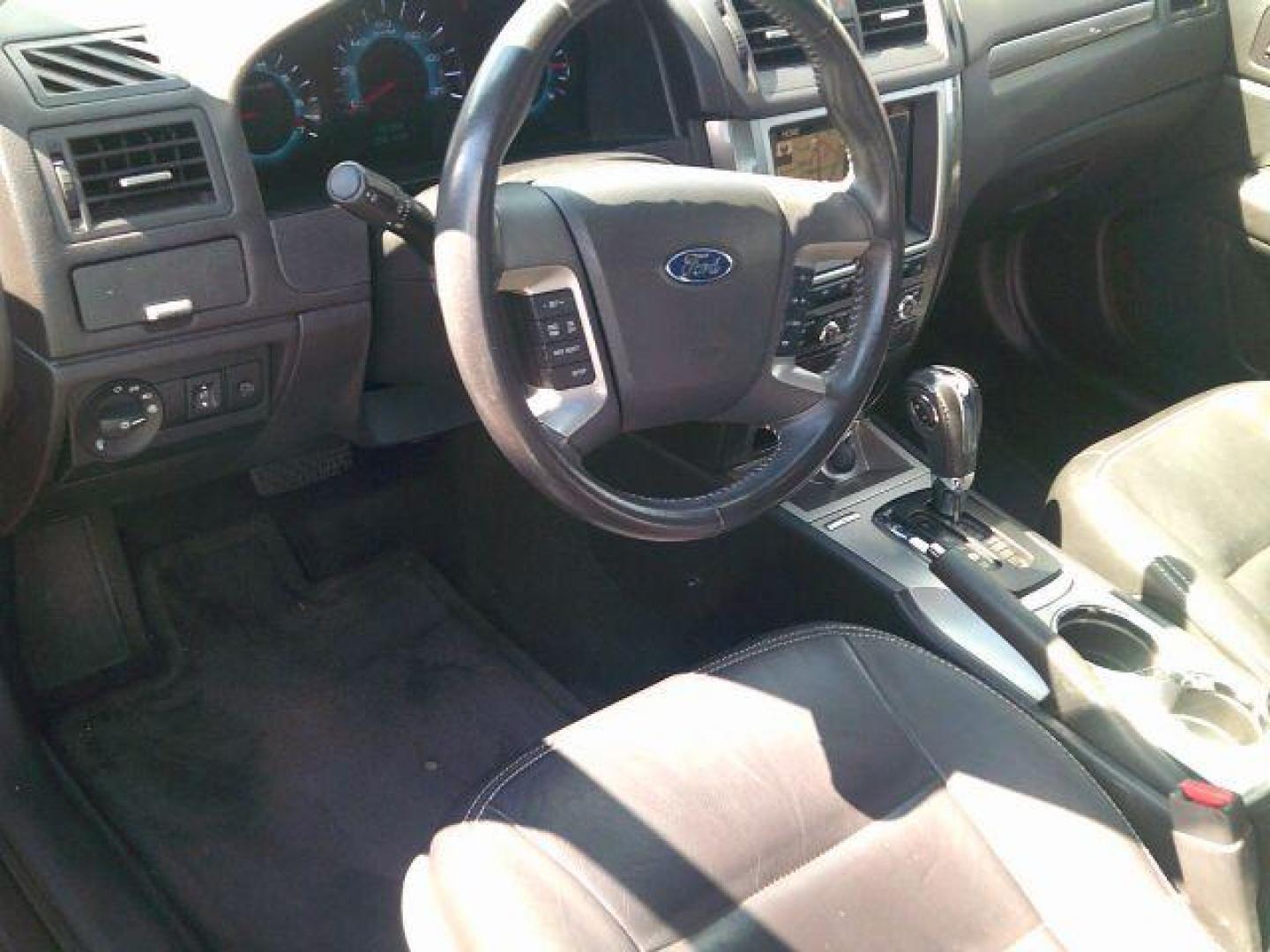 2011 Ingot Silver Metallic /Charcoal Black Ford Fusion SEL (3FAHP0JG8BR) with an 3L V-6 DOHC engine, 5-Speed Automatic transmission, located at 116 N. Frazier Street, Conroe, TX, 77301, (936) 647-0690, 30.308662, -95.460480 - Photo#7