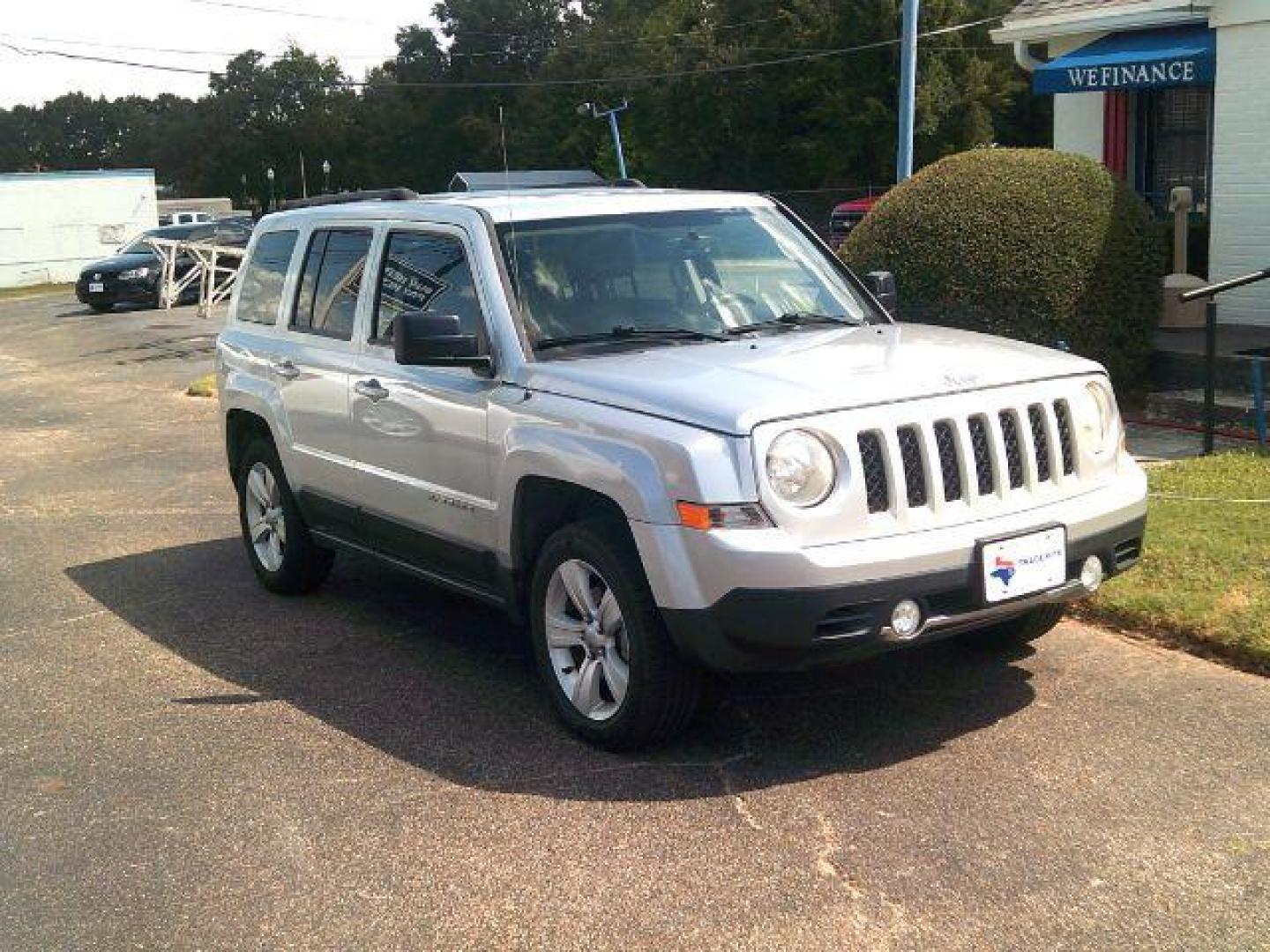 2013 Bright Silver Metallic Clearcoat /Dark Slate Gray Jeep Patriot Limited (1C4NJPCB8DD) with an 2.4L I-4 DOHC engine, 5-Speed Automatic transmission, located at 116 N. Frazier Street, Conroe, TX, 77301, (936) 647-0690, 30.308662, -95.460480 - Photo#1