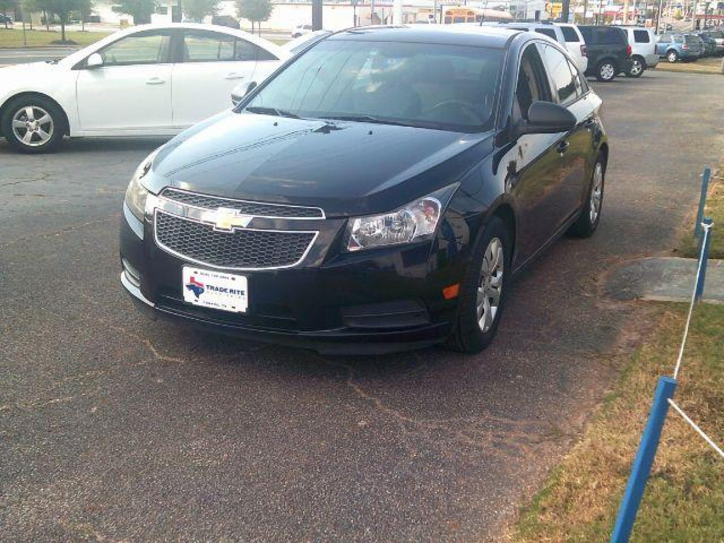 2014 BLACK Chevrolet Cruze LS Auto (1G1PA5SH0E7) with an ECOTEC 1.8L I-4 DOHC engine, located at 116 N. Frazier Street, Conroe, TX, 77301, (936) 647-0690, 30.308662, -95.460480 - Photo#2