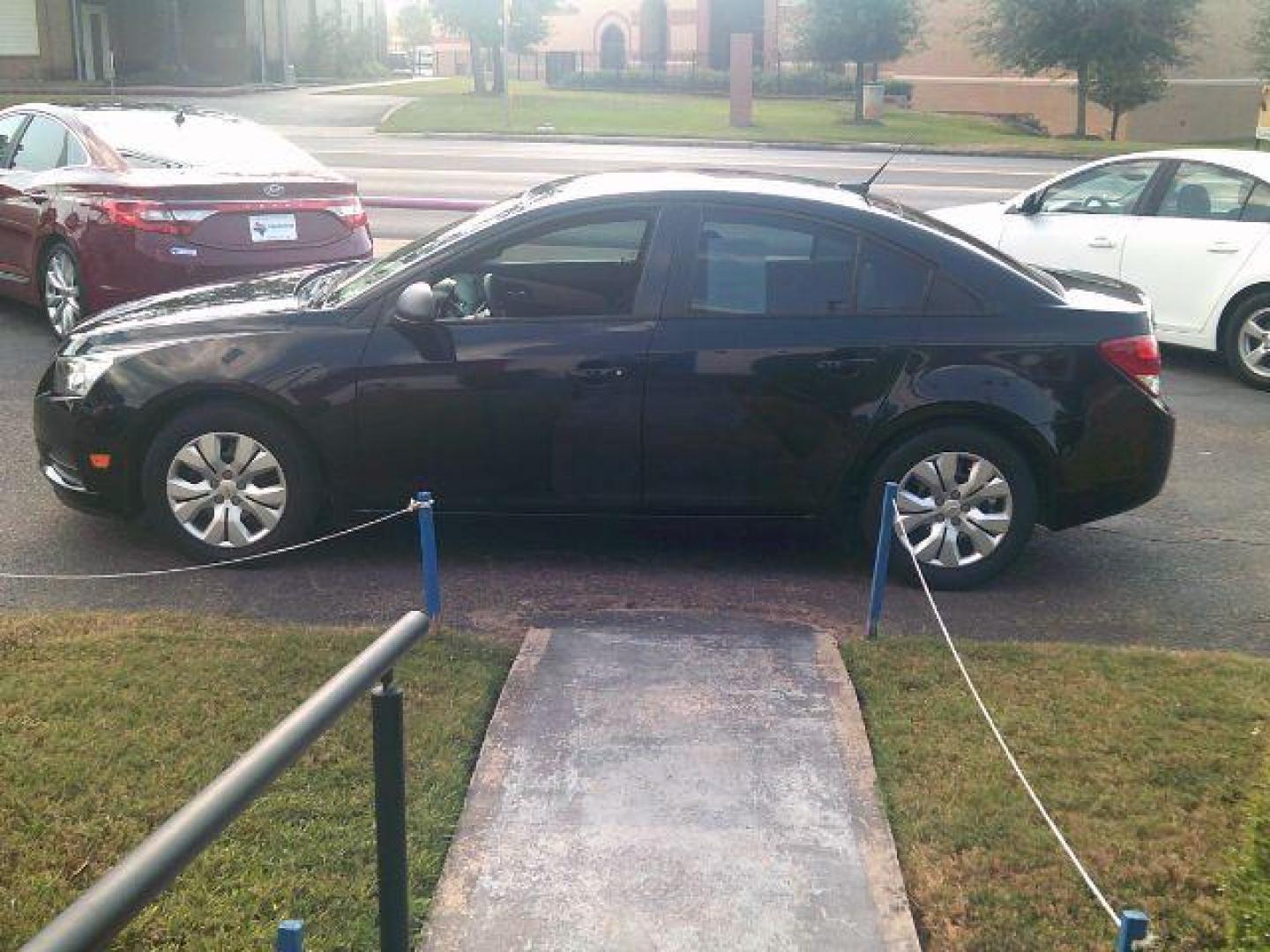 2014 BLACK Chevrolet Cruze LS Auto (1G1PA5SH0E7) with an ECOTEC 1.8L I-4 DOHC engine, located at 116 N. Frazier Street, Conroe, TX, 77301, (936) 647-0690, 30.308662, -95.460480 - Photo#3