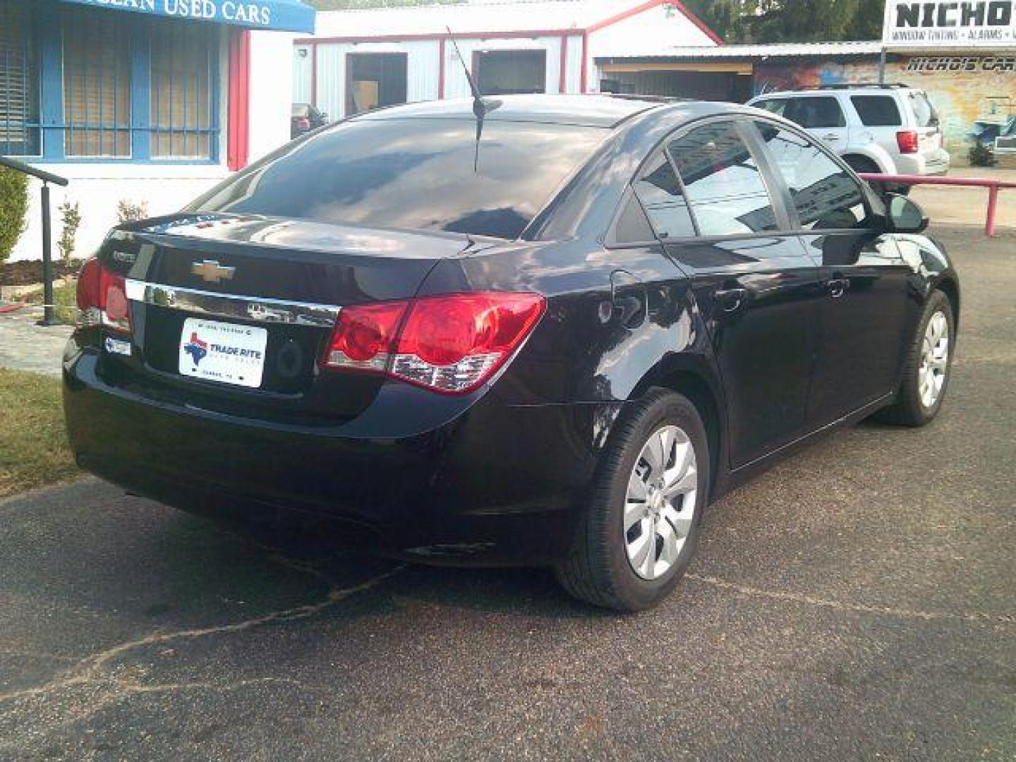2014 BLACK Chevrolet Cruze LS Auto (1G1PA5SH0E7) with an ECOTEC 1.8L I-4 DOHC engine, located at 116 N. Frazier Street, Conroe, TX, 77301, (936) 647-0690, 30.308662, -95.460480 - Photo#5