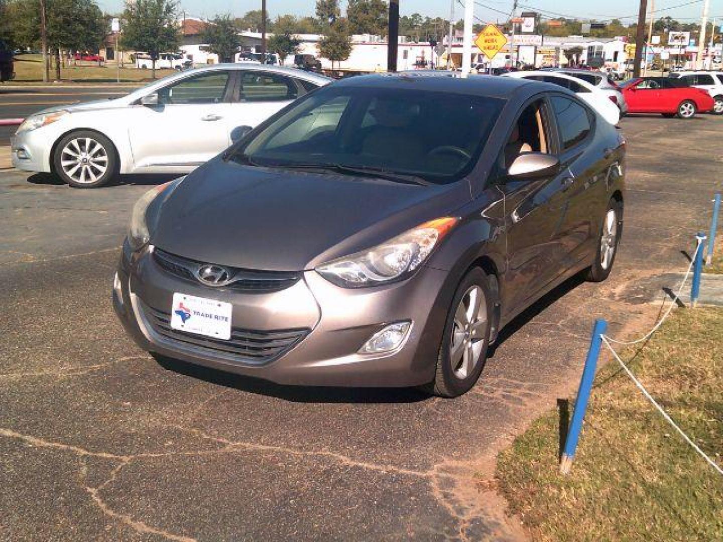 2013 BROWN Hyundai Elantra GLS (5NPDH4AE0DH) with an 1.8L I-4 DOHC engine, located at 116 N. Frazier Street, Conroe, TX, 77301, (936) 647-0690, 30.308662, -95.460480 - Photo#2
