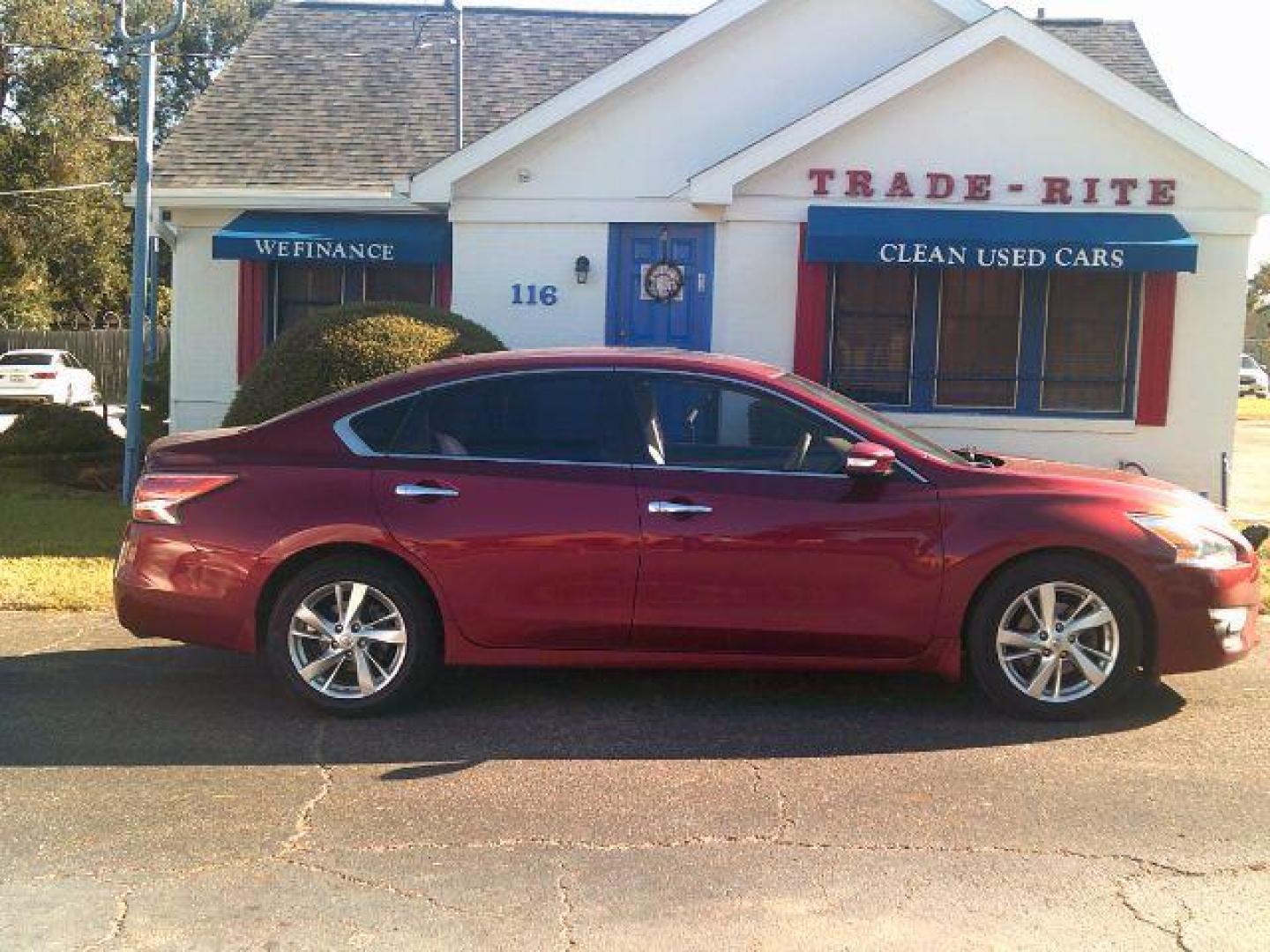 2015 Cayenne Red Nissan Altima 2.5 SL (1N4AL3AP9FN) with an 2.5L I-4 DOHC engine, located at 116 N. Frazier Street, Conroe, TX, 77301, (936) 647-0690, 30.308662, -95.460480 - Photo#0